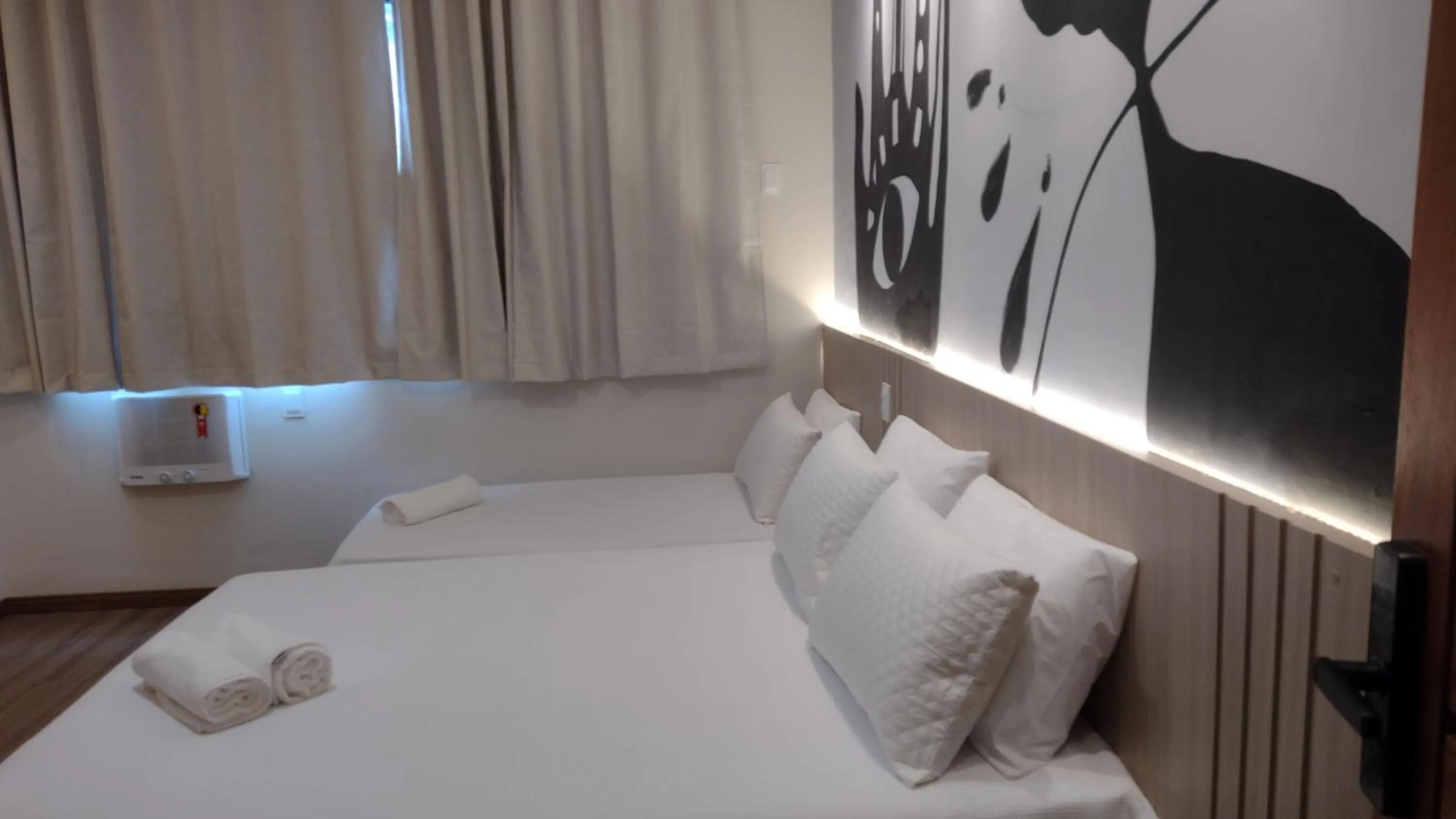 Photo of the whole room in Pousada Boutique Raio de Luz