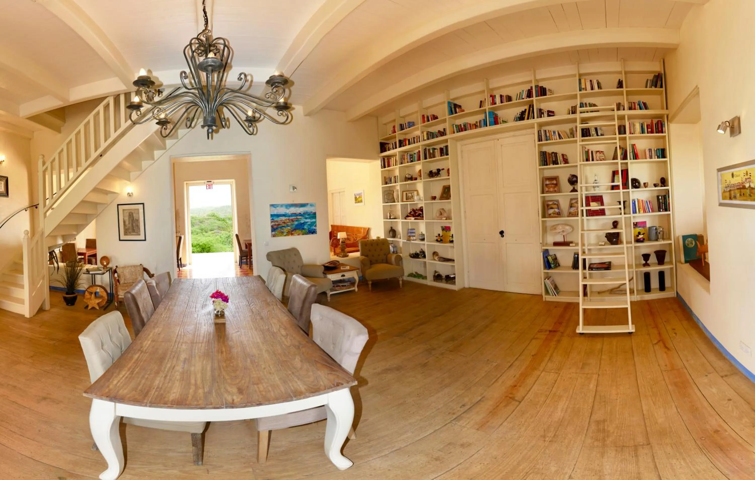 Communal lounge/ TV room in Landhuis Klein Santa Martha Boutique Hotel Restaurant.