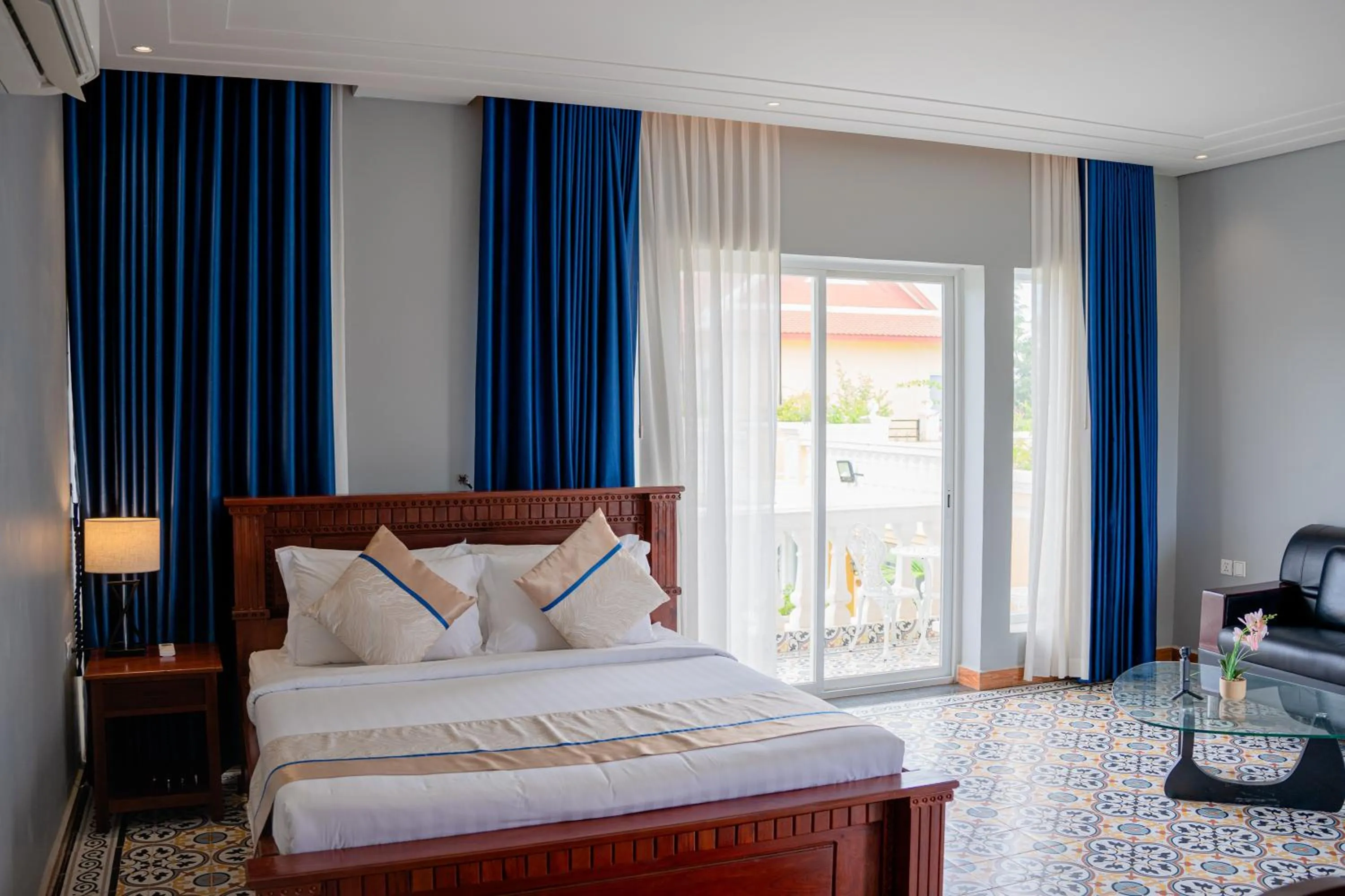 Bed in Sokchea Kampot Hotel