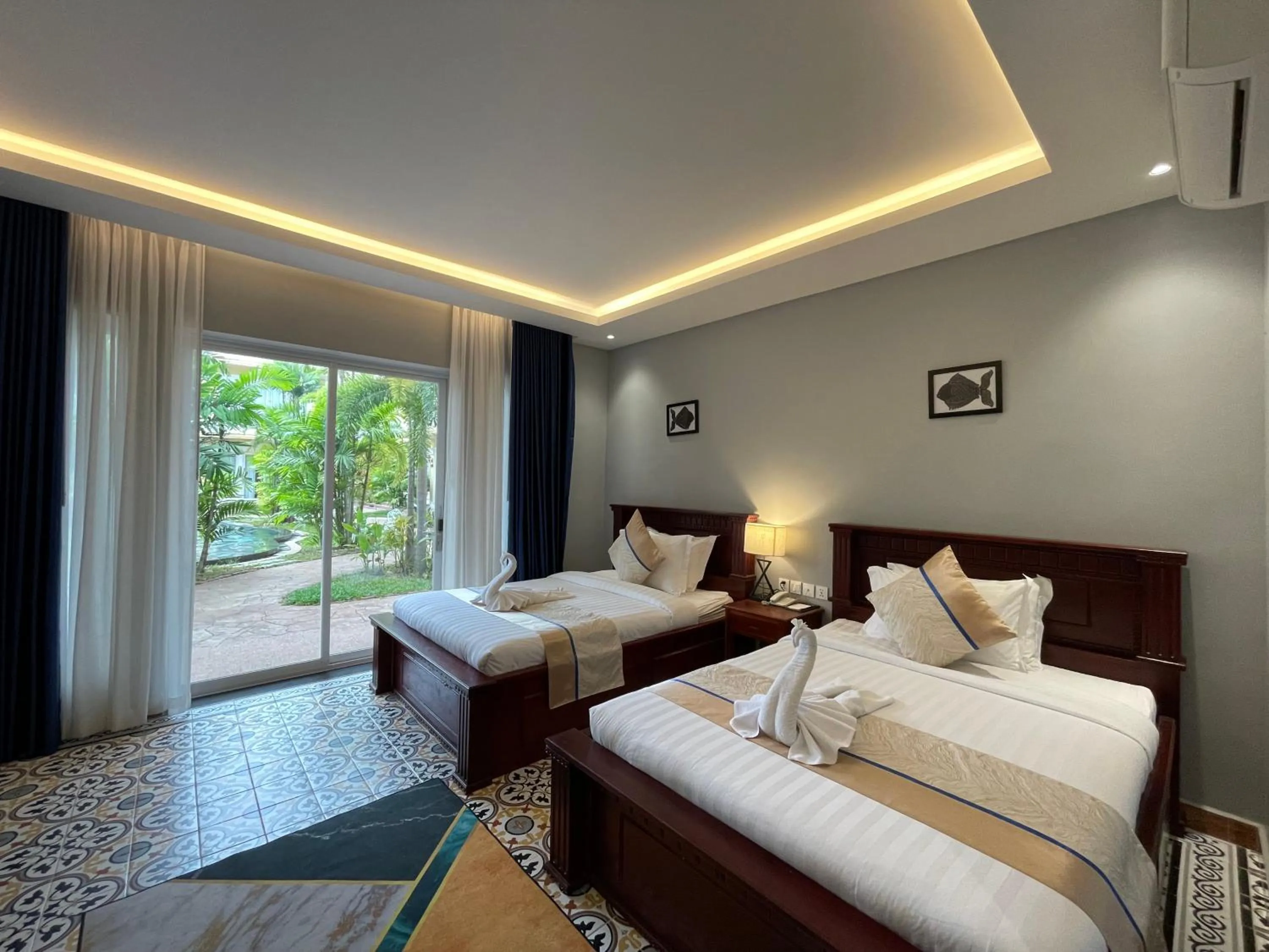 Bed in Sokchea Kampot Hotel