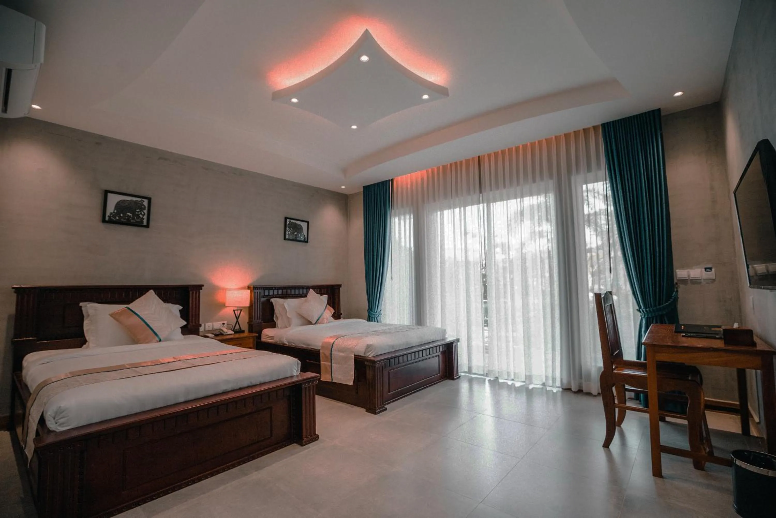 Photo of the whole room, Bed in Sokchea Kampot Hotel