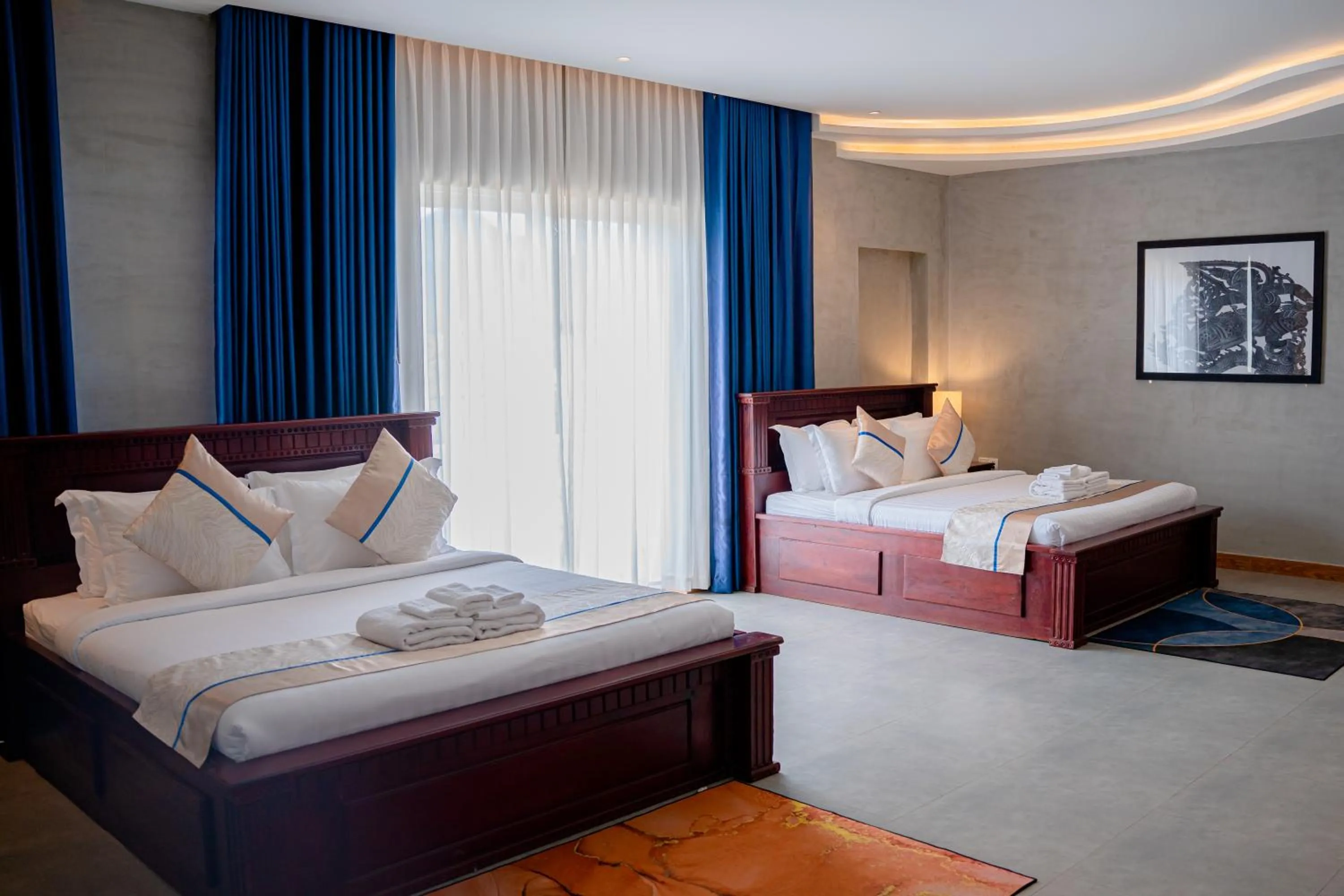 Bed in Sokchea Kampot Hotel