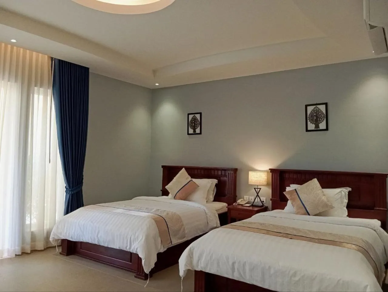 Bed in Sokchea Kampot Hotel