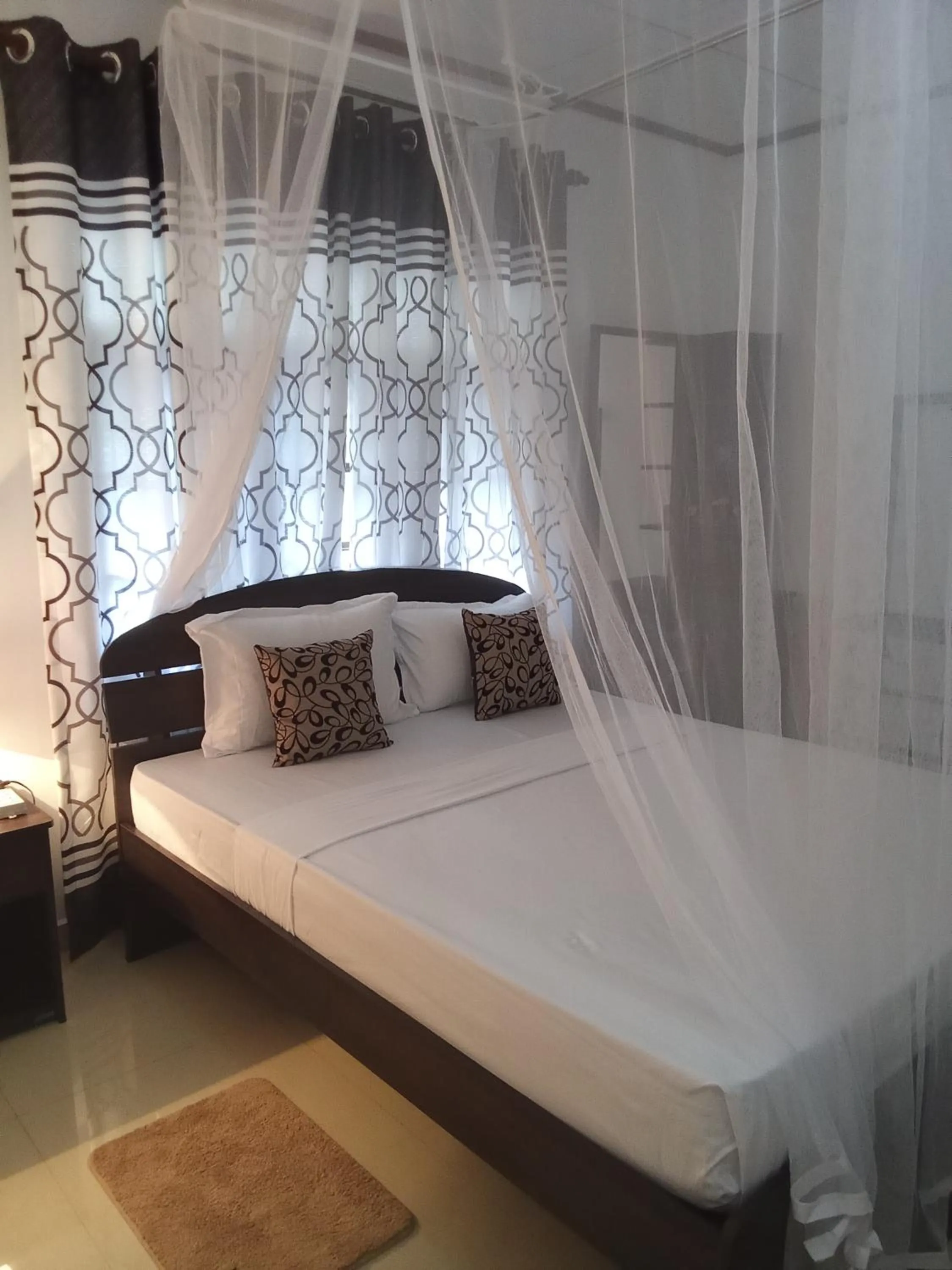 Bed in Kavee Transit Hotel