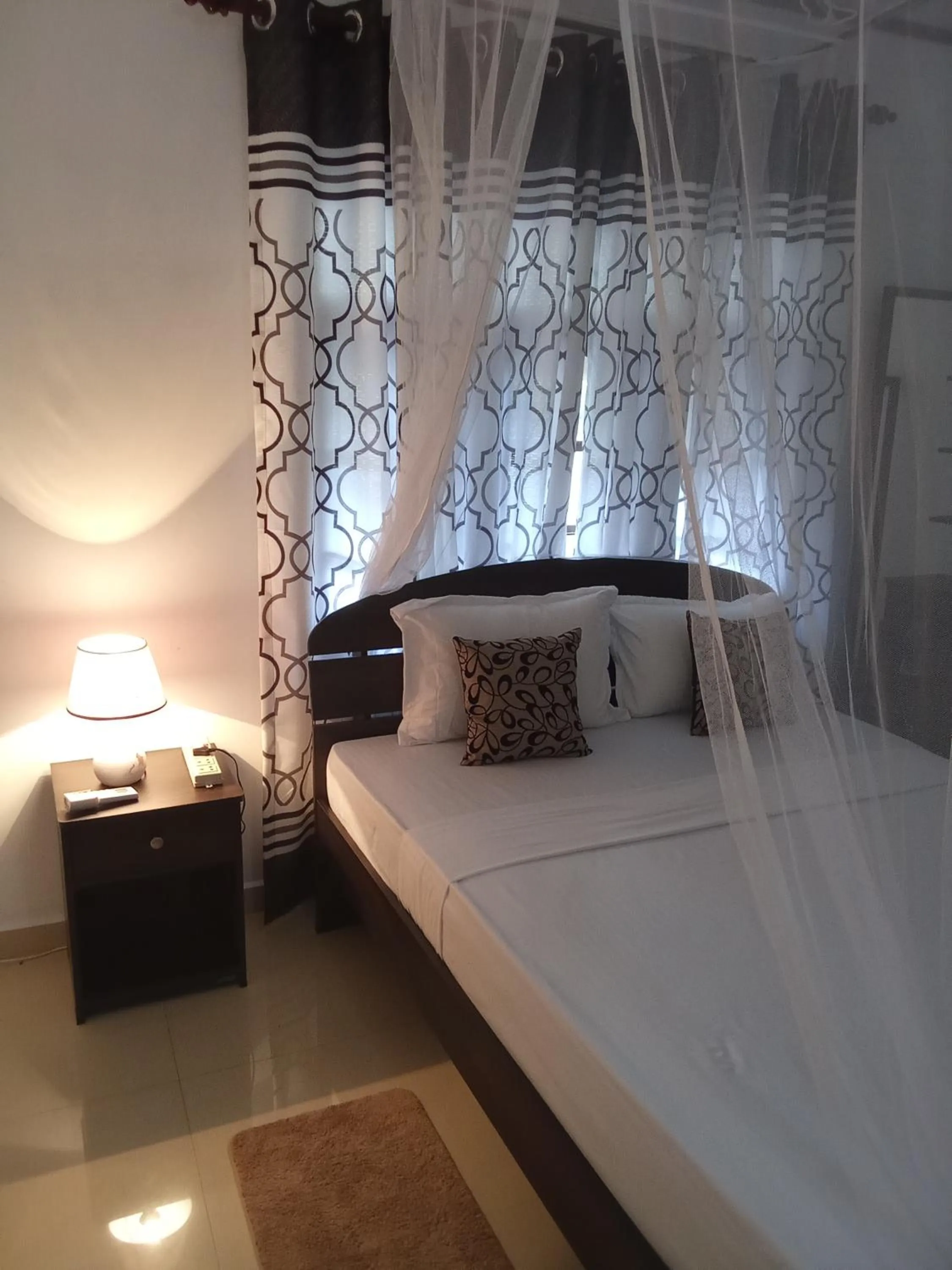 Bed in Kavee Transit Hotel