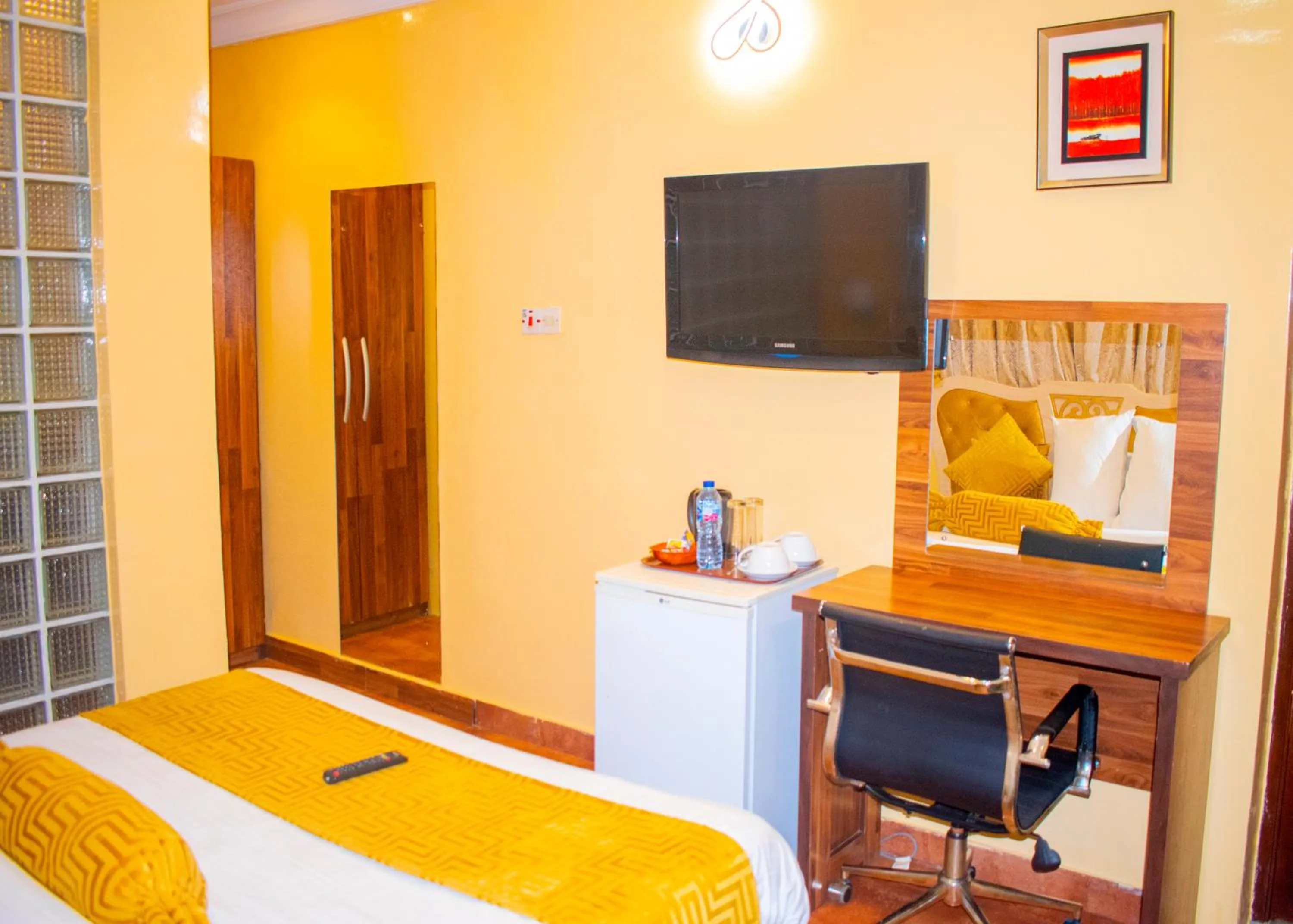 Bed in ERiTH APARTMENT & SUITES