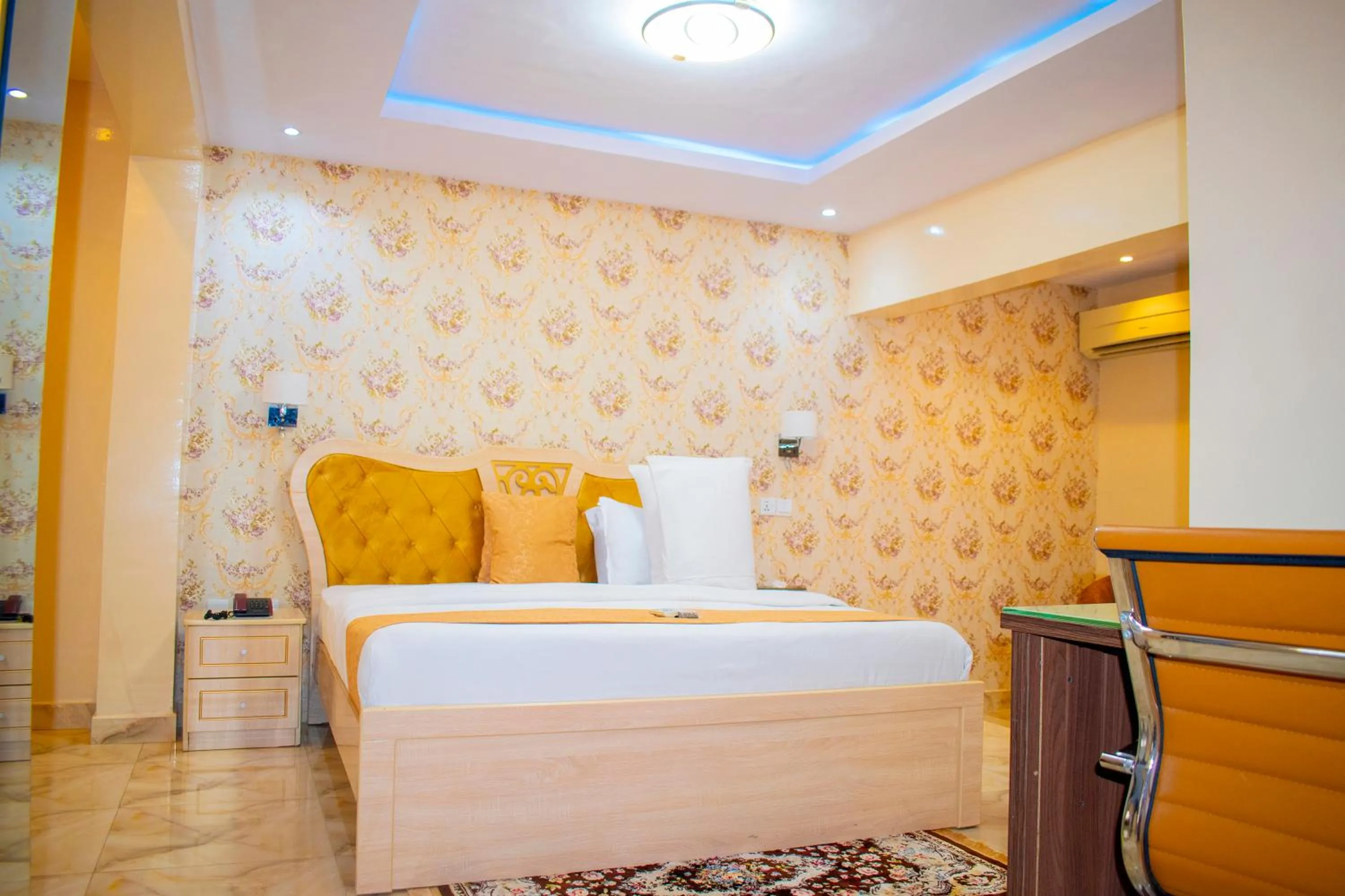 Bed in ERiTH APARTMENT & SUITES