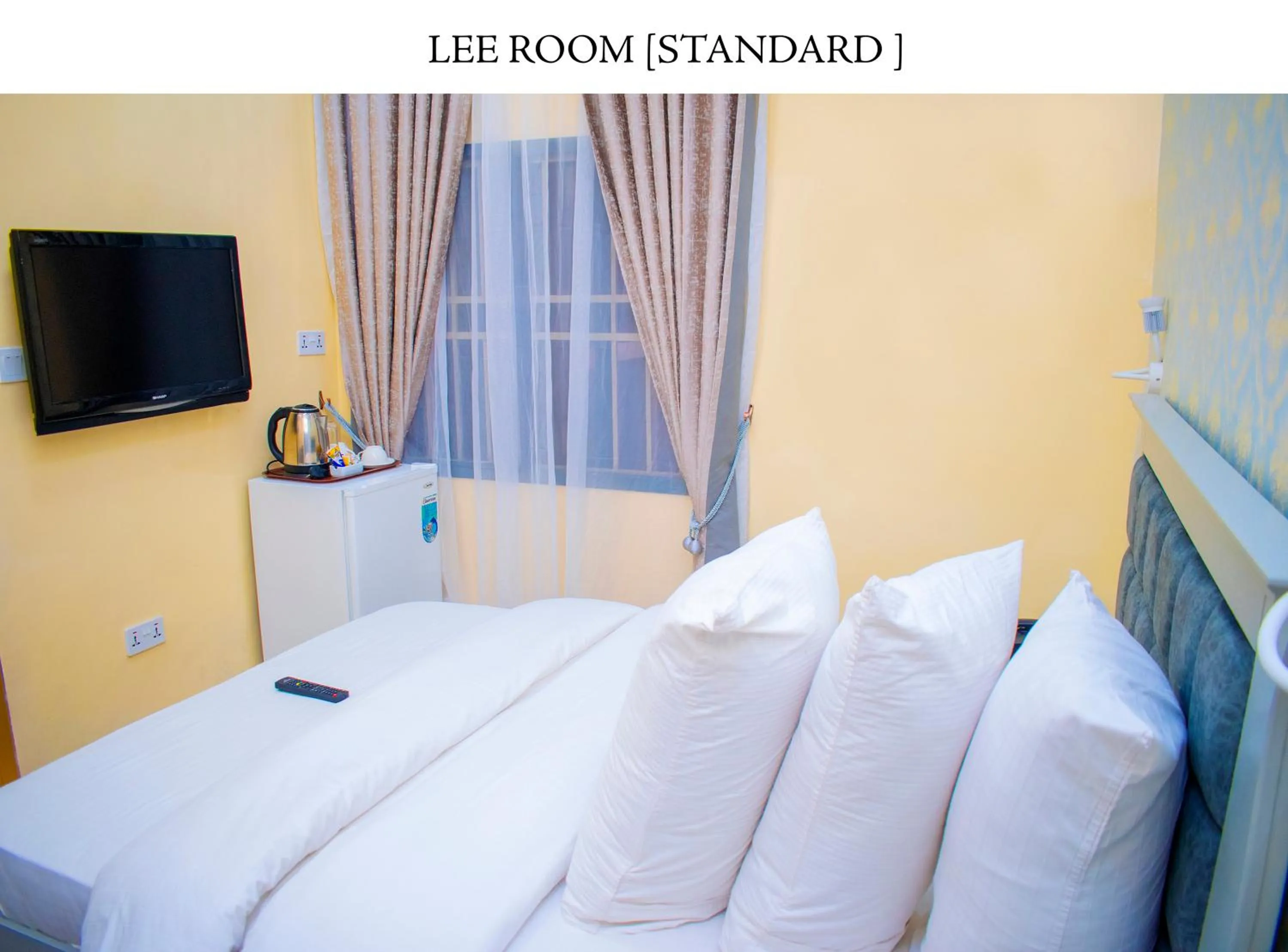 Bed in ERiTH APARTMENT & SUITES