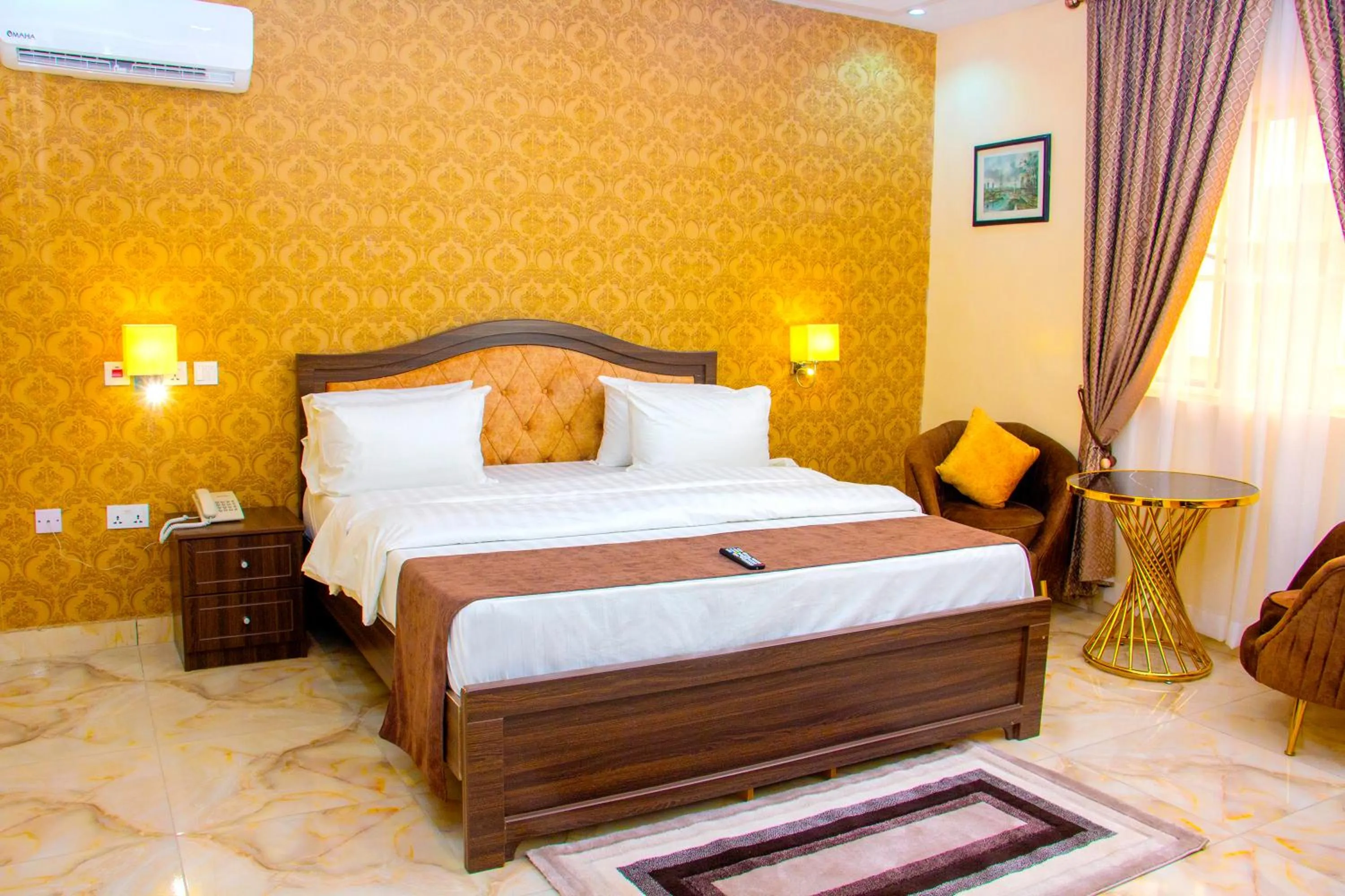 Bed in ERiTH APARTMENT & SUITES