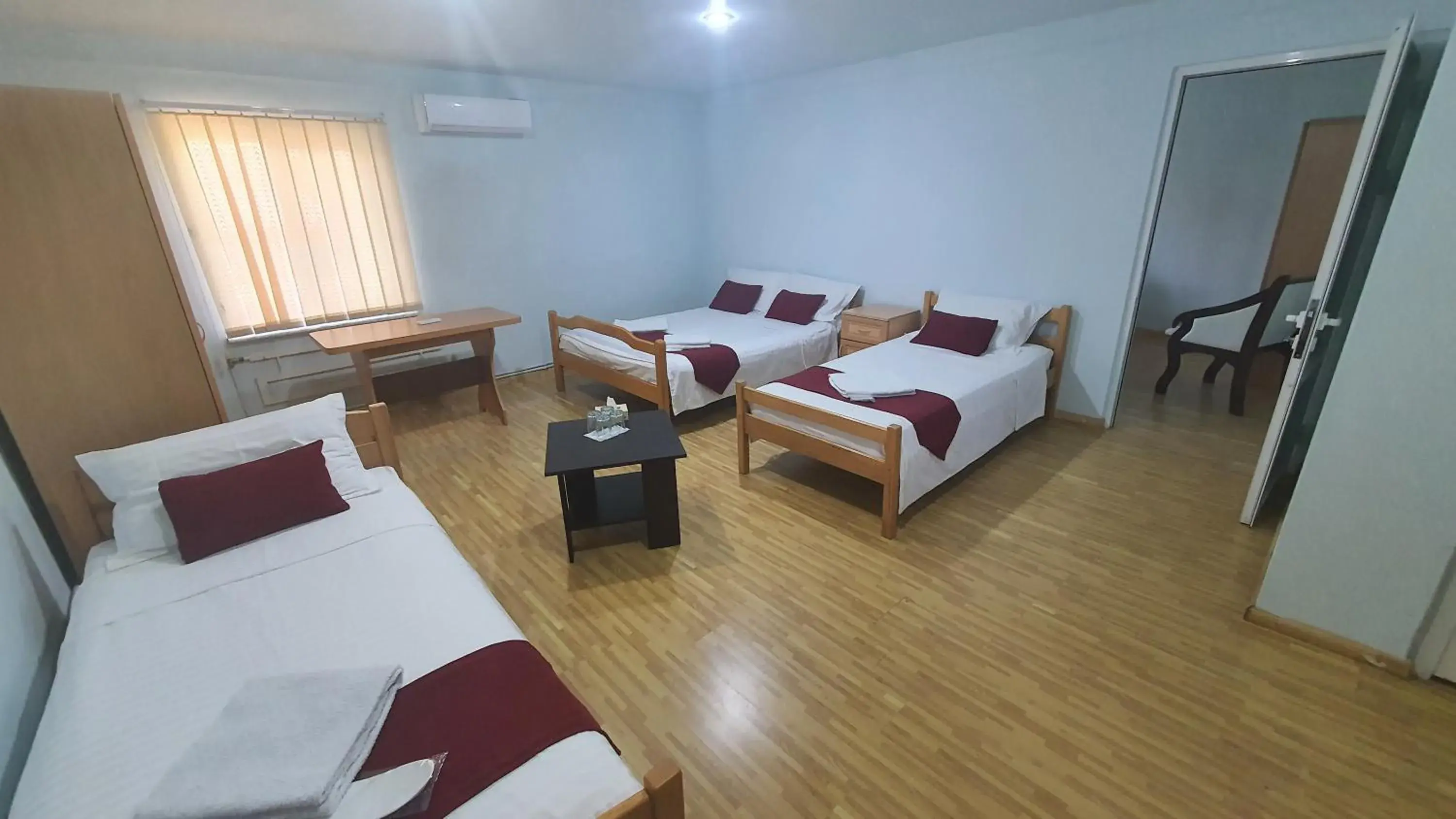 Standard Quadruple Room in Kesabella Touristic House Standard Quadruple Room in Kesabella Touristic House