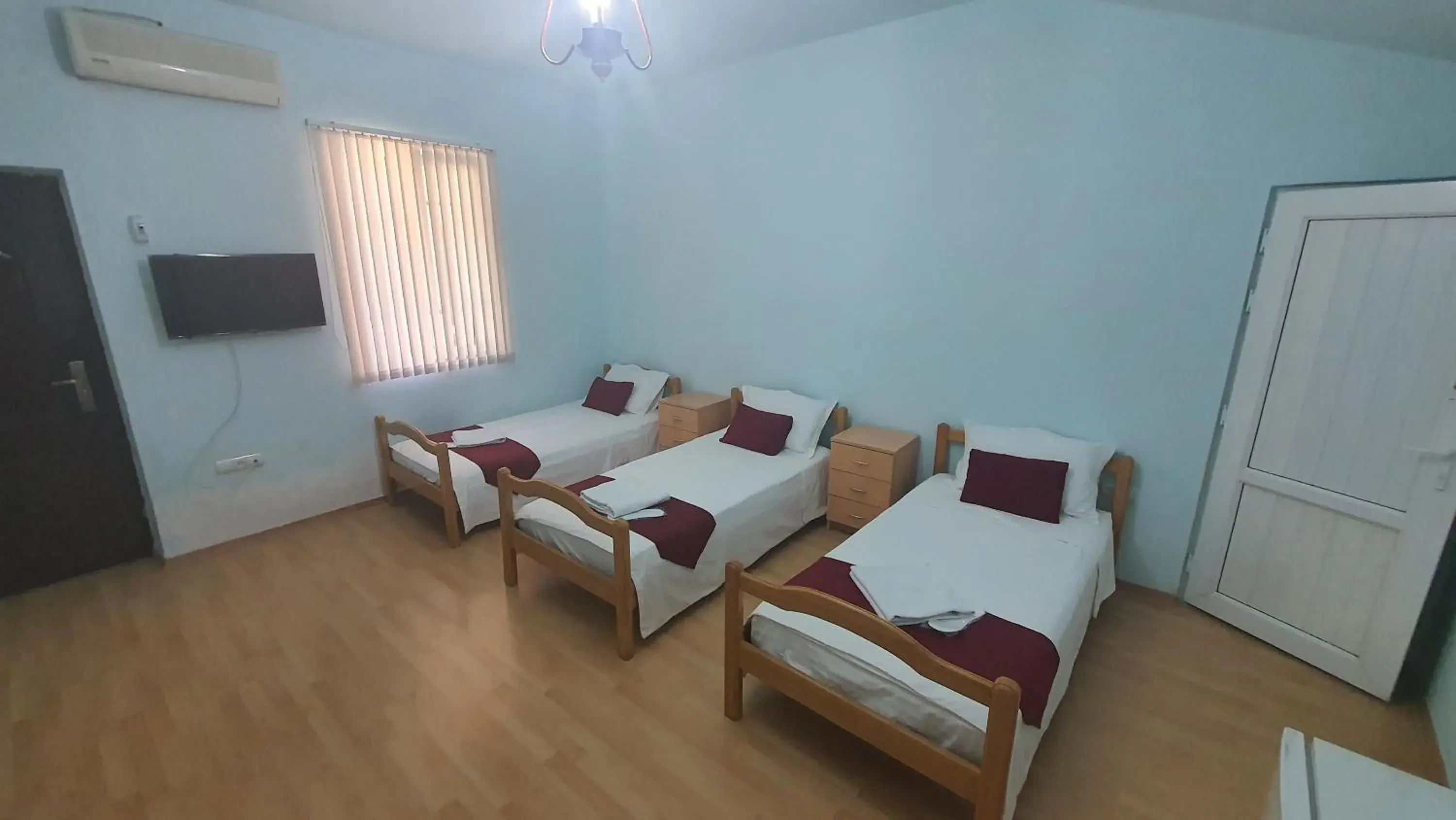 Standard Triple Room in Kesabella Touristic House Standard Triple Room in Kesabella Touristic House