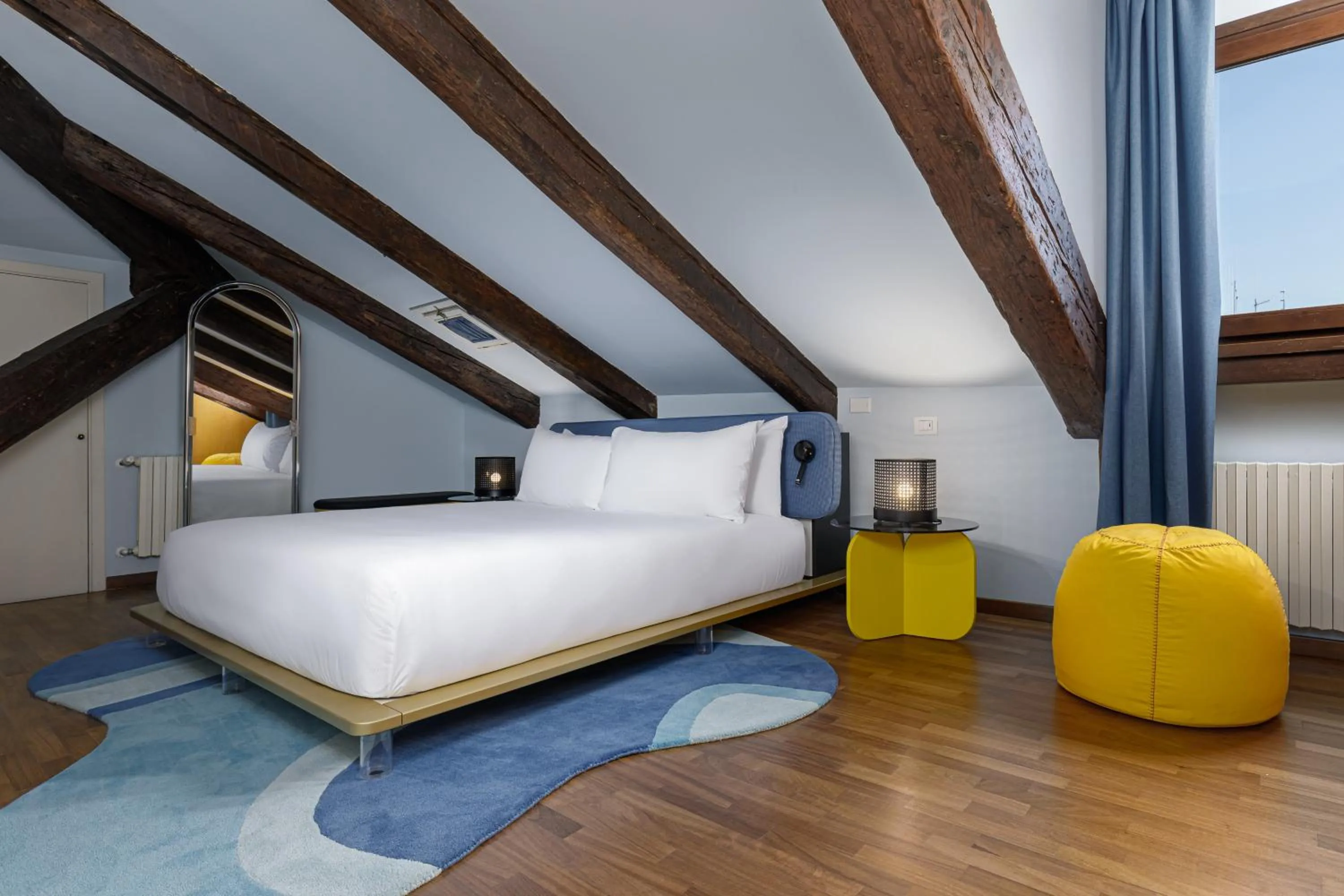 Bed in Palazzo Dei Fiori by Room Mate