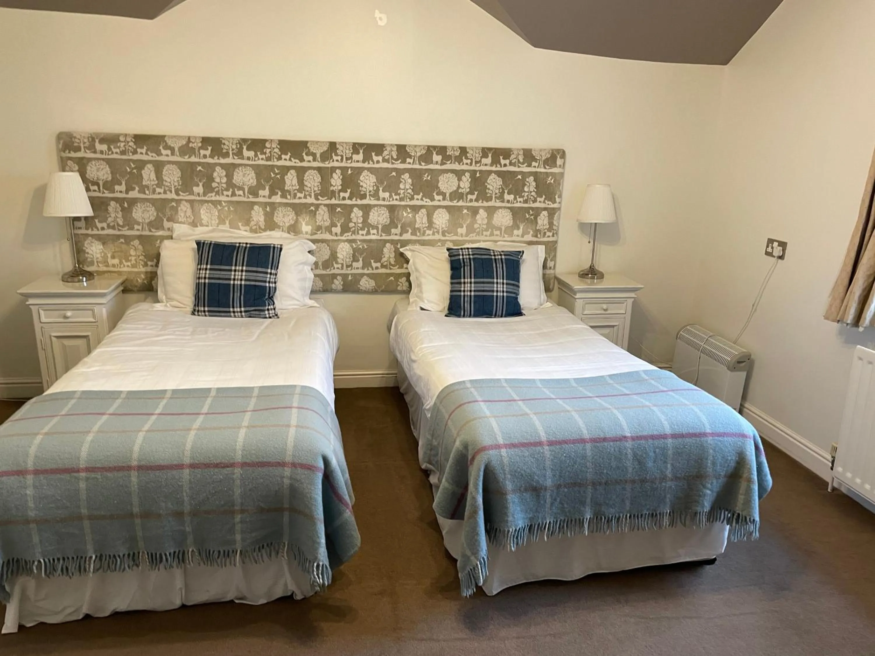 Bed in New Inn Hotel