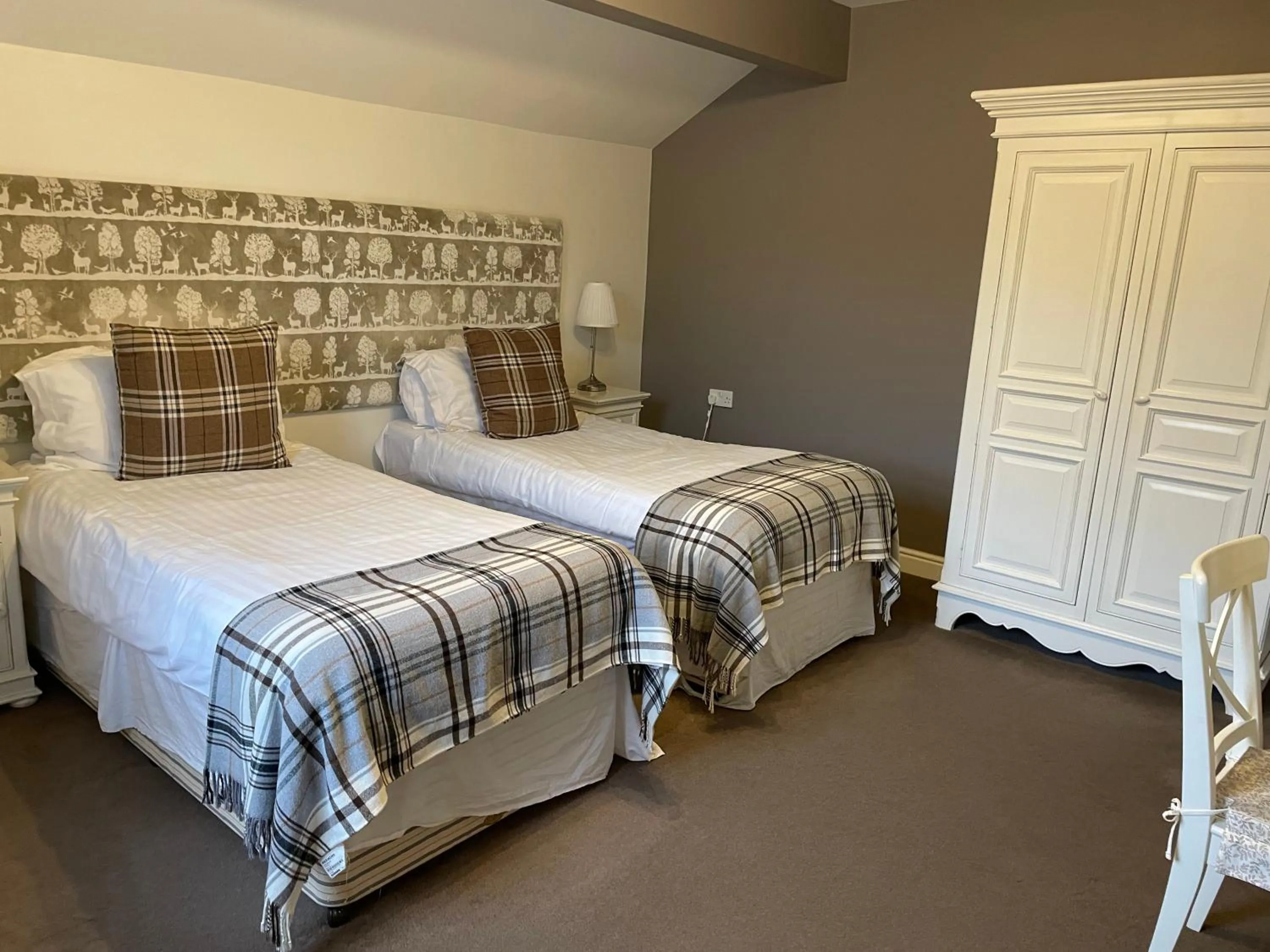 Bed in New Inn Hotel