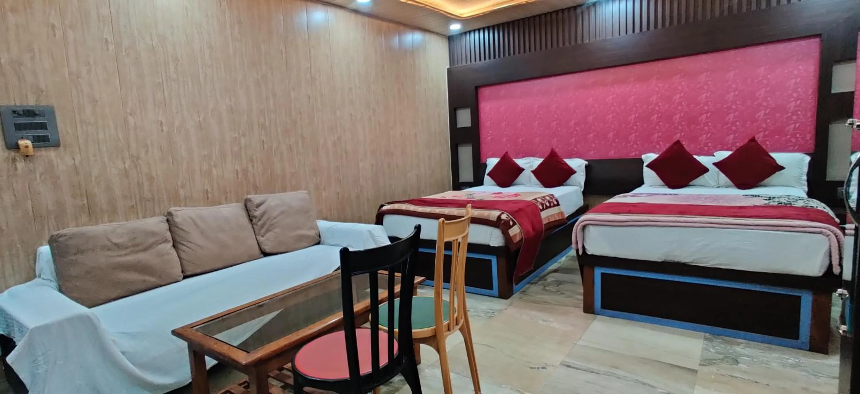 Bed in Hotel Nirmala Inn