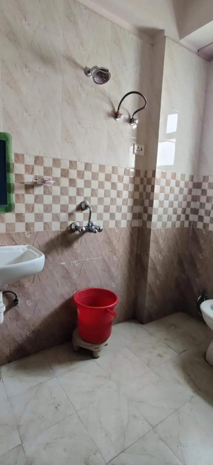 Toilet in Hotel Nirmala Inn