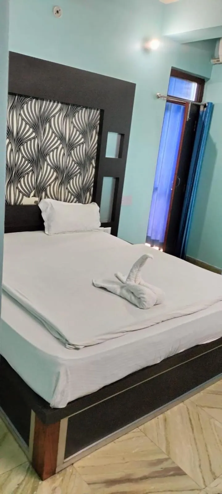 Bed in Hotel Nirmala Inn