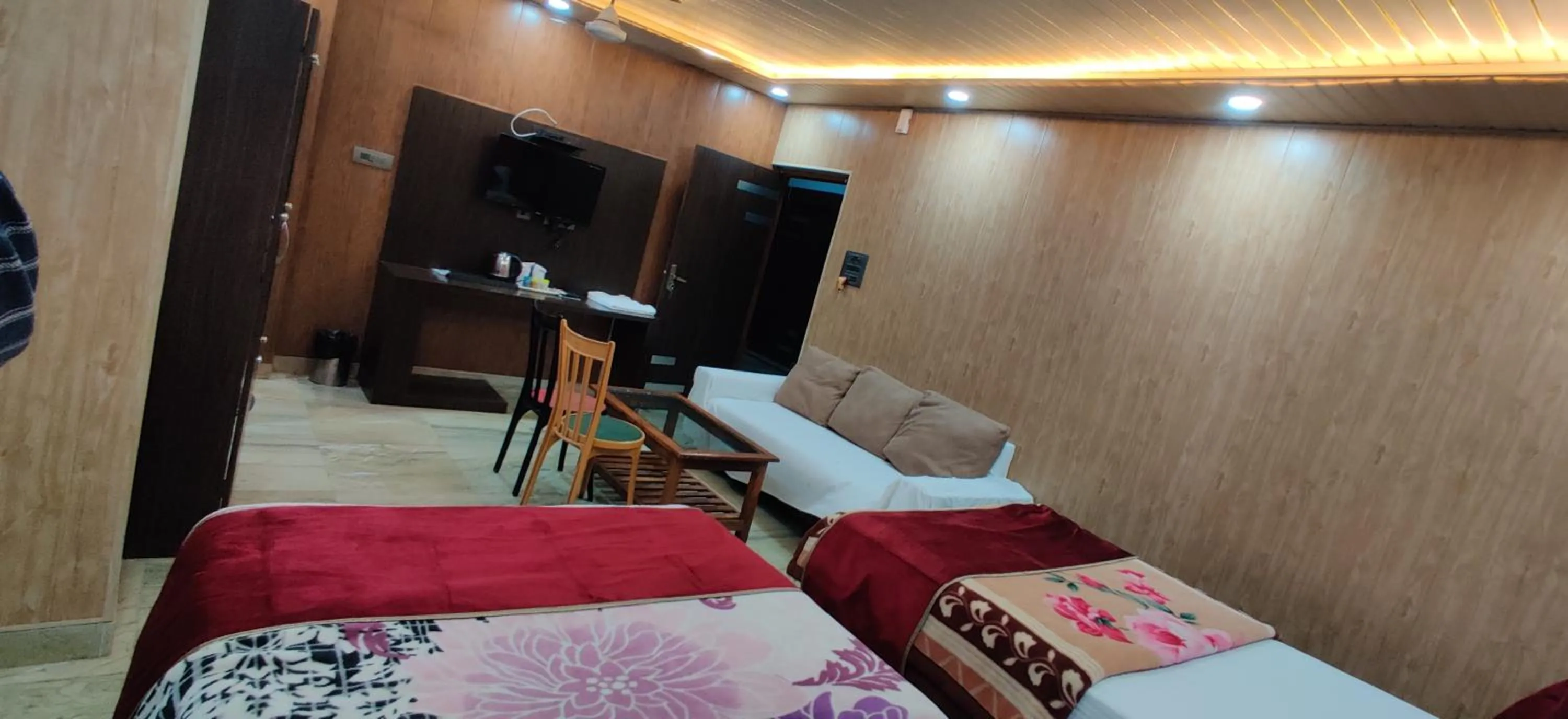 Bed in Hotel Nirmala Inn