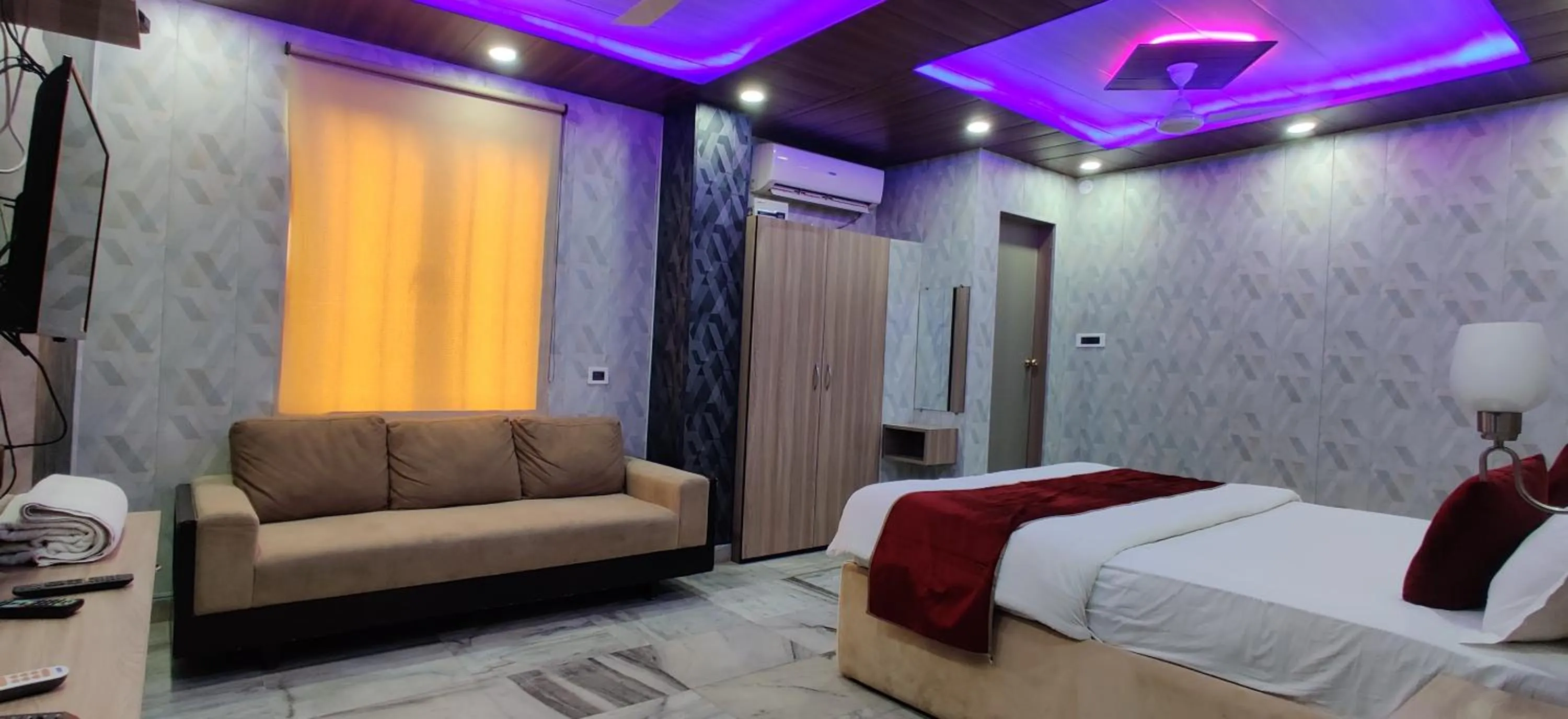 Bed in Hotel Nirmala Inn