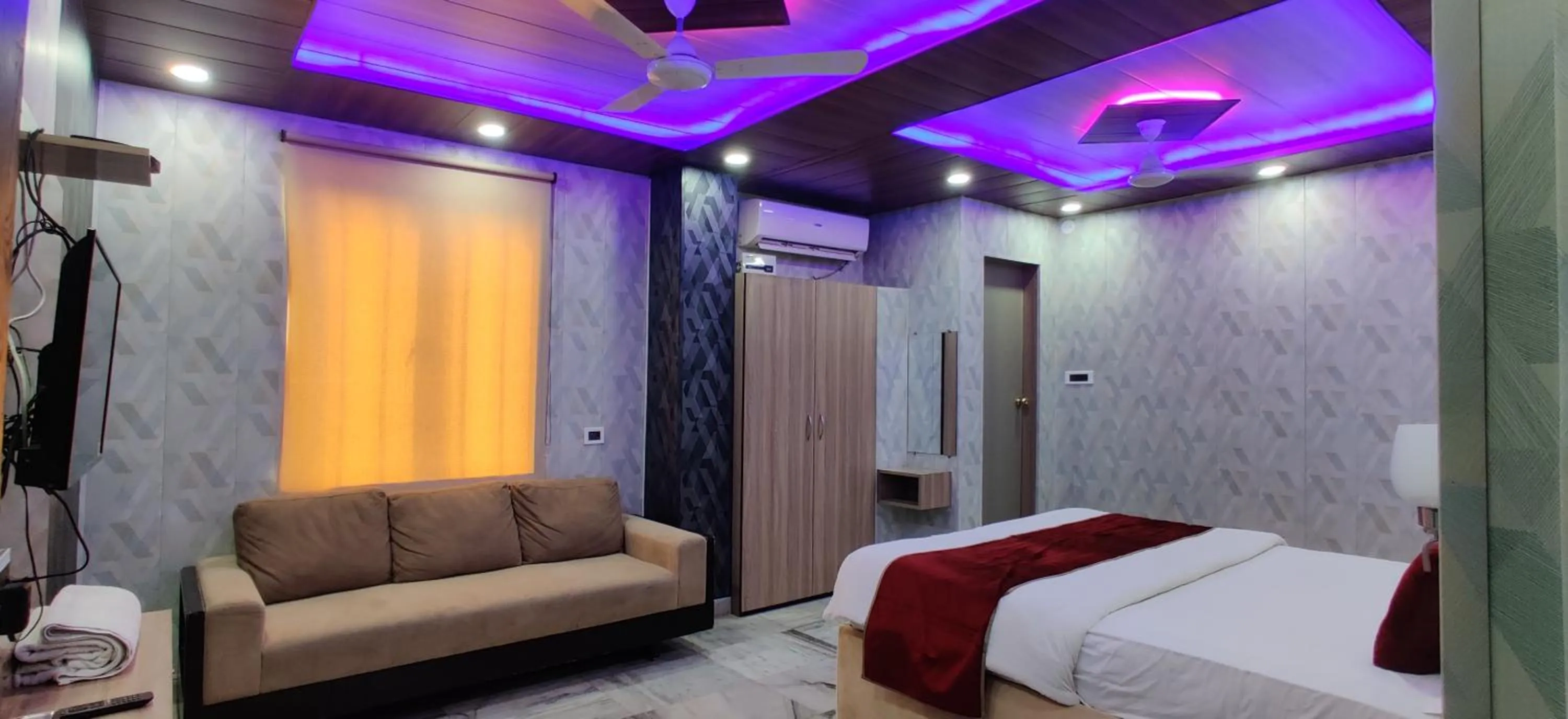 Bed in Hotel Nirmala Inn