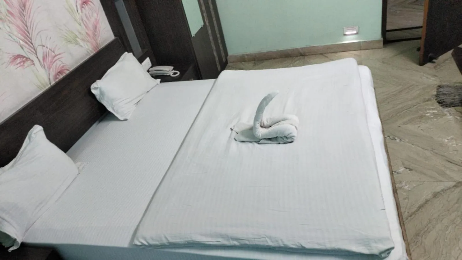 Bed in Hotel Nirmala Inn