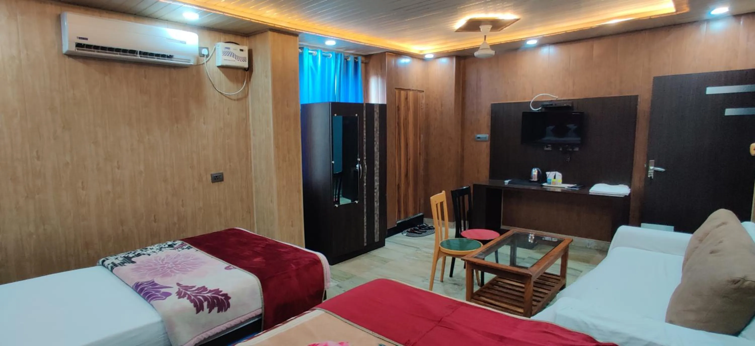 Bed in Hotel Nirmala Inn