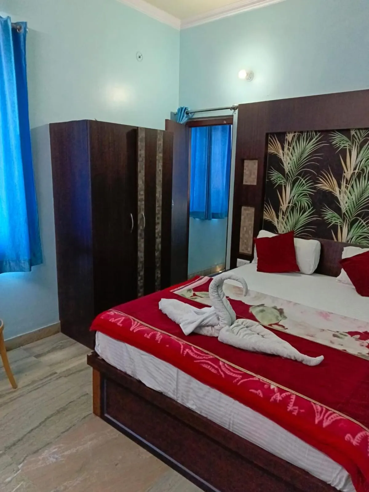 Bed in Hotel Nirmala Inn