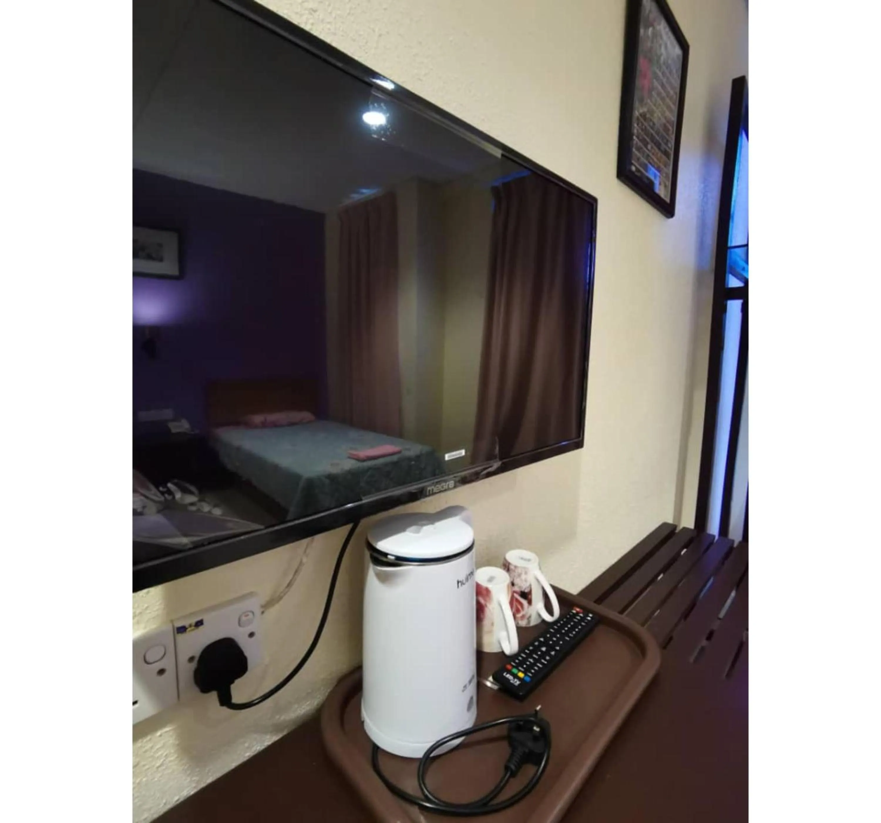 TV and multimedia in Hotel O Pavilion Inn Hotel