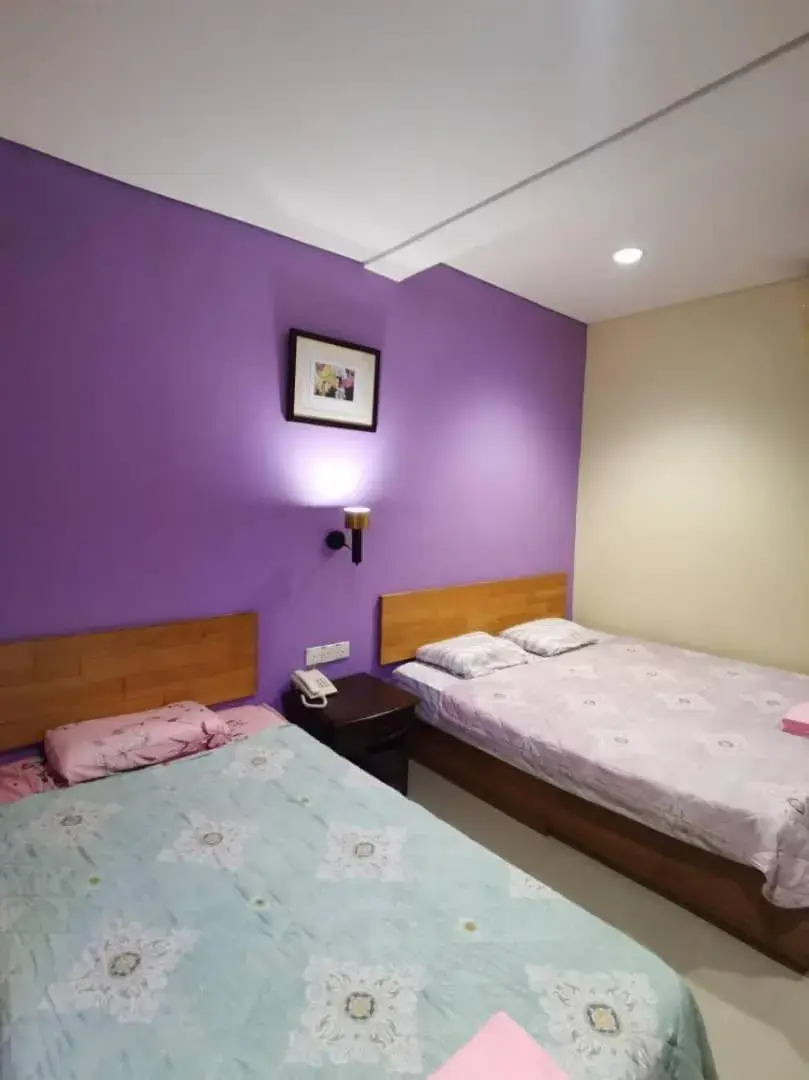 Deluxe Triple Room in Hotel O Pavilion Inn Hotel Deluxe Triple Room in Hotel O Pavilion Inn Hotel