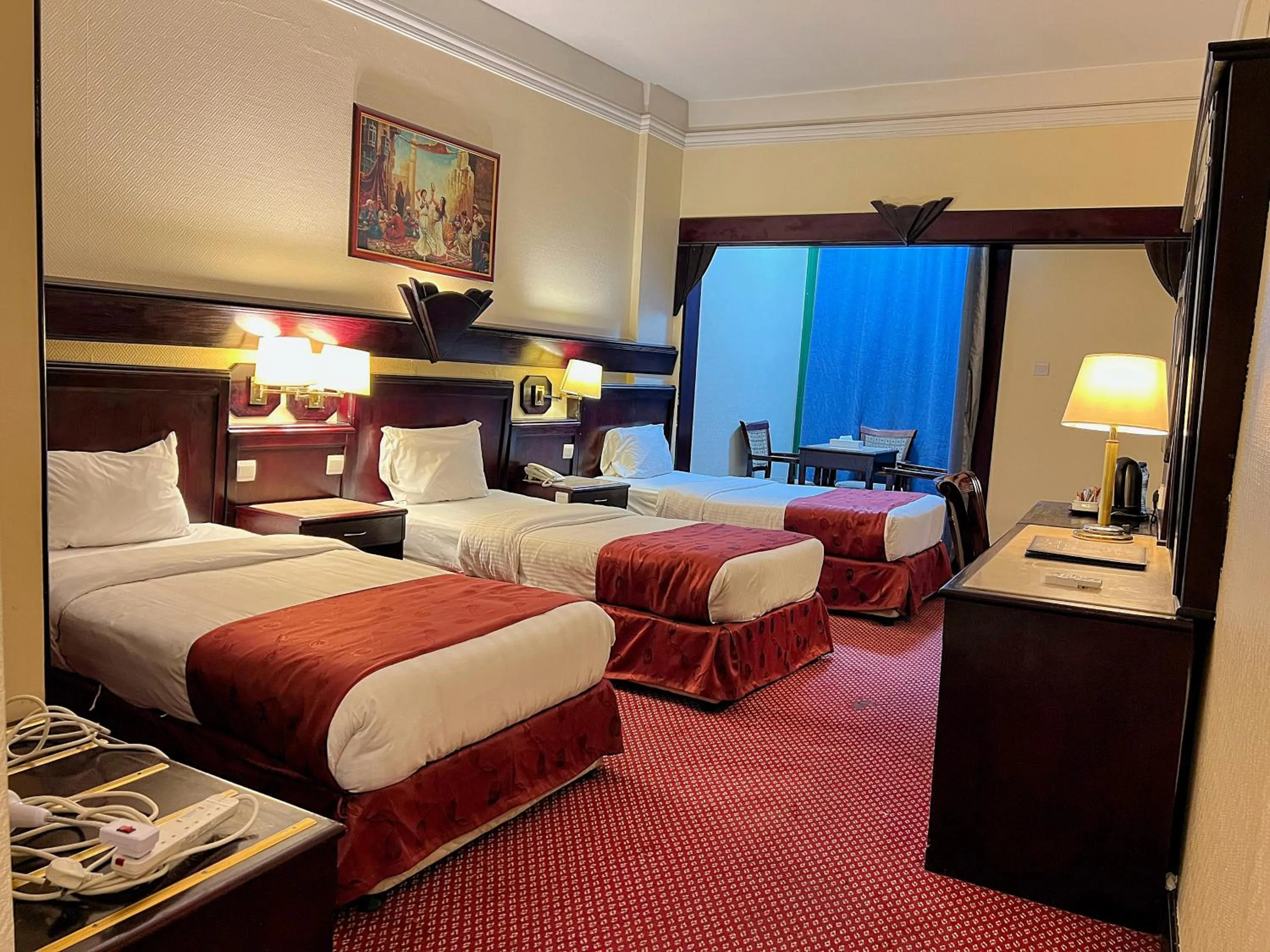 Bed in Claridge Hotel Dubai