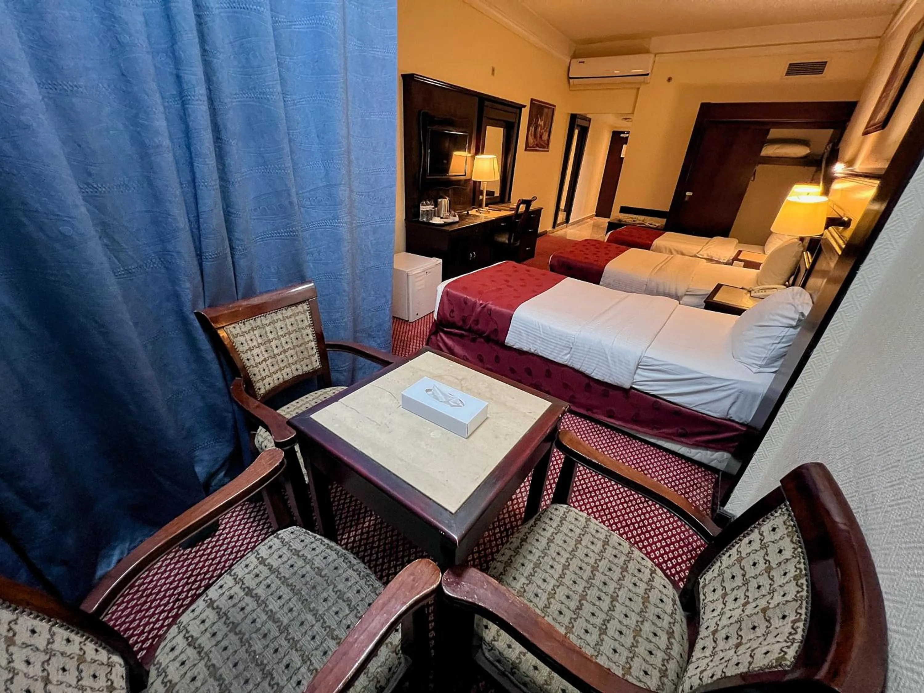 Bed in Claridge Hotel Dubai