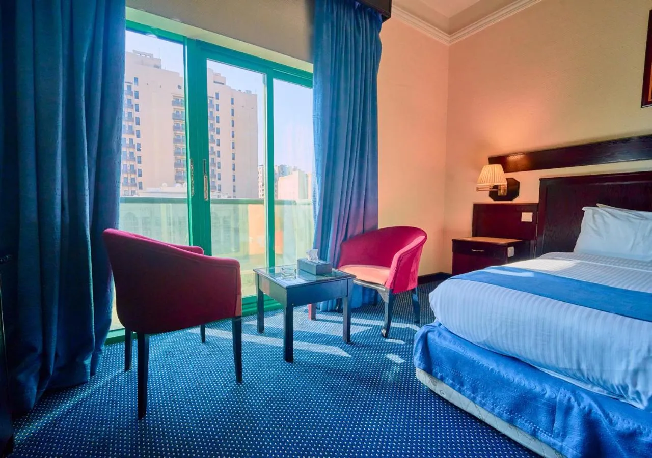 Bed in Claridge Hotel Dubai