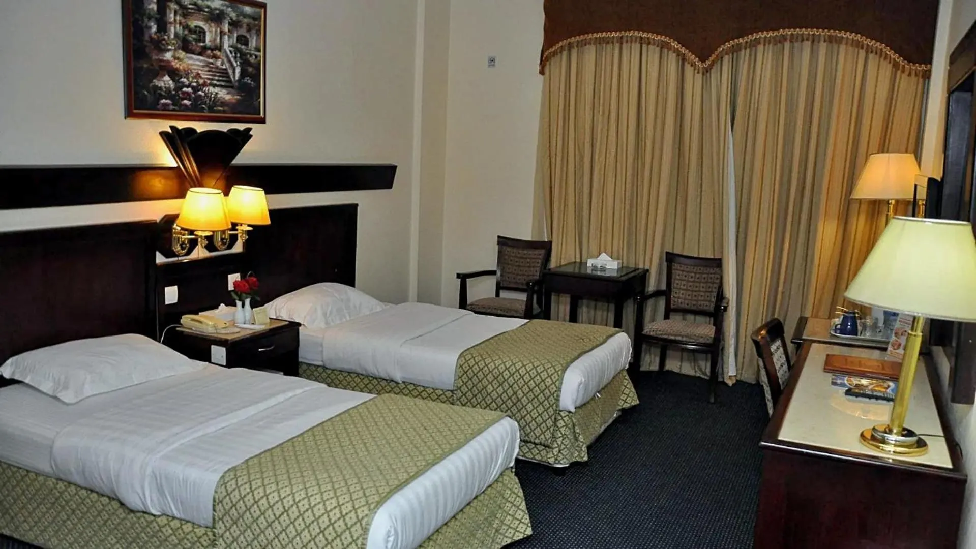 Bed in Claridge Hotel Dubai