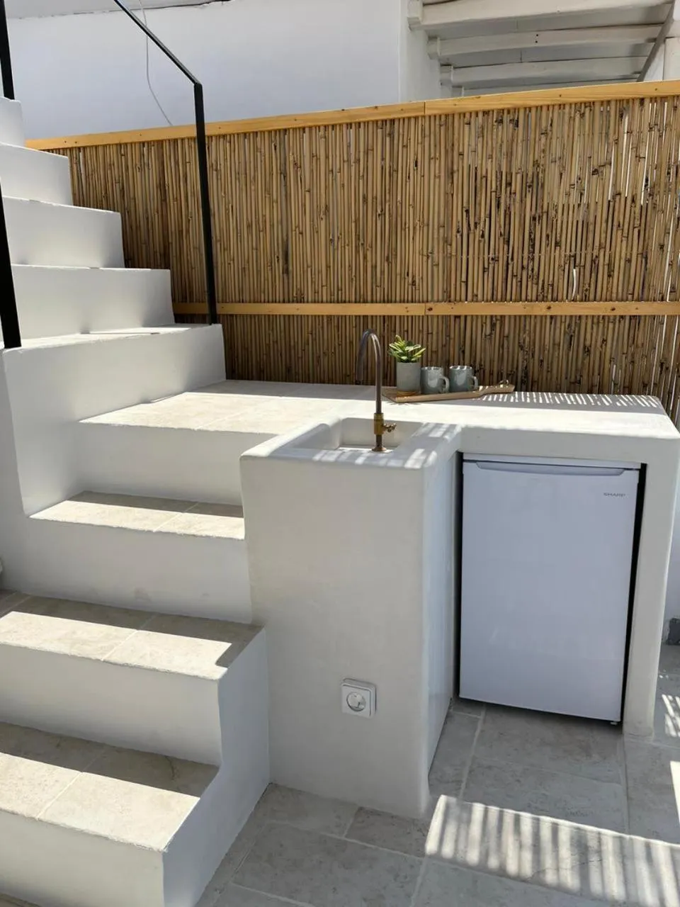 Kitchen or kitchenette in aníko suites White Alley