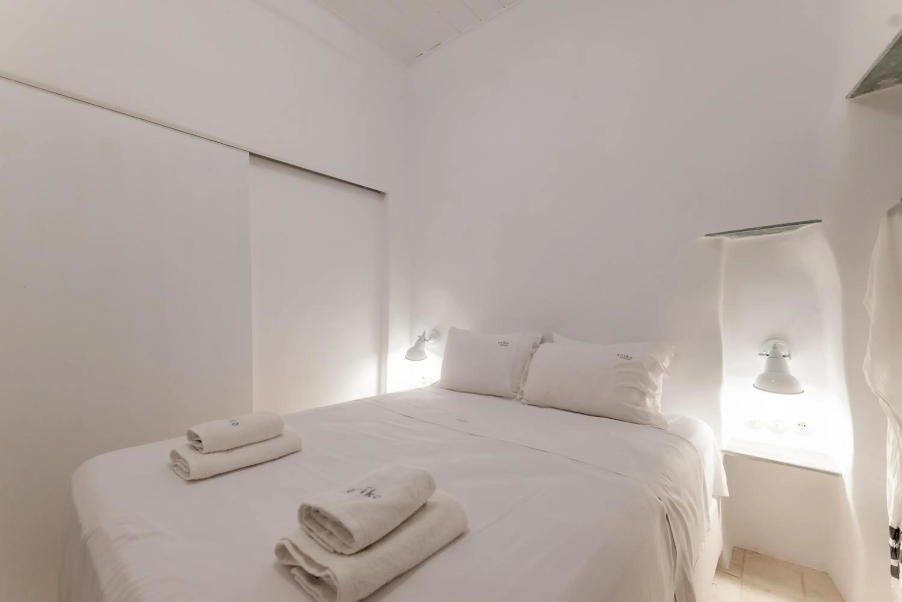 Bed in aníko suites White Alley