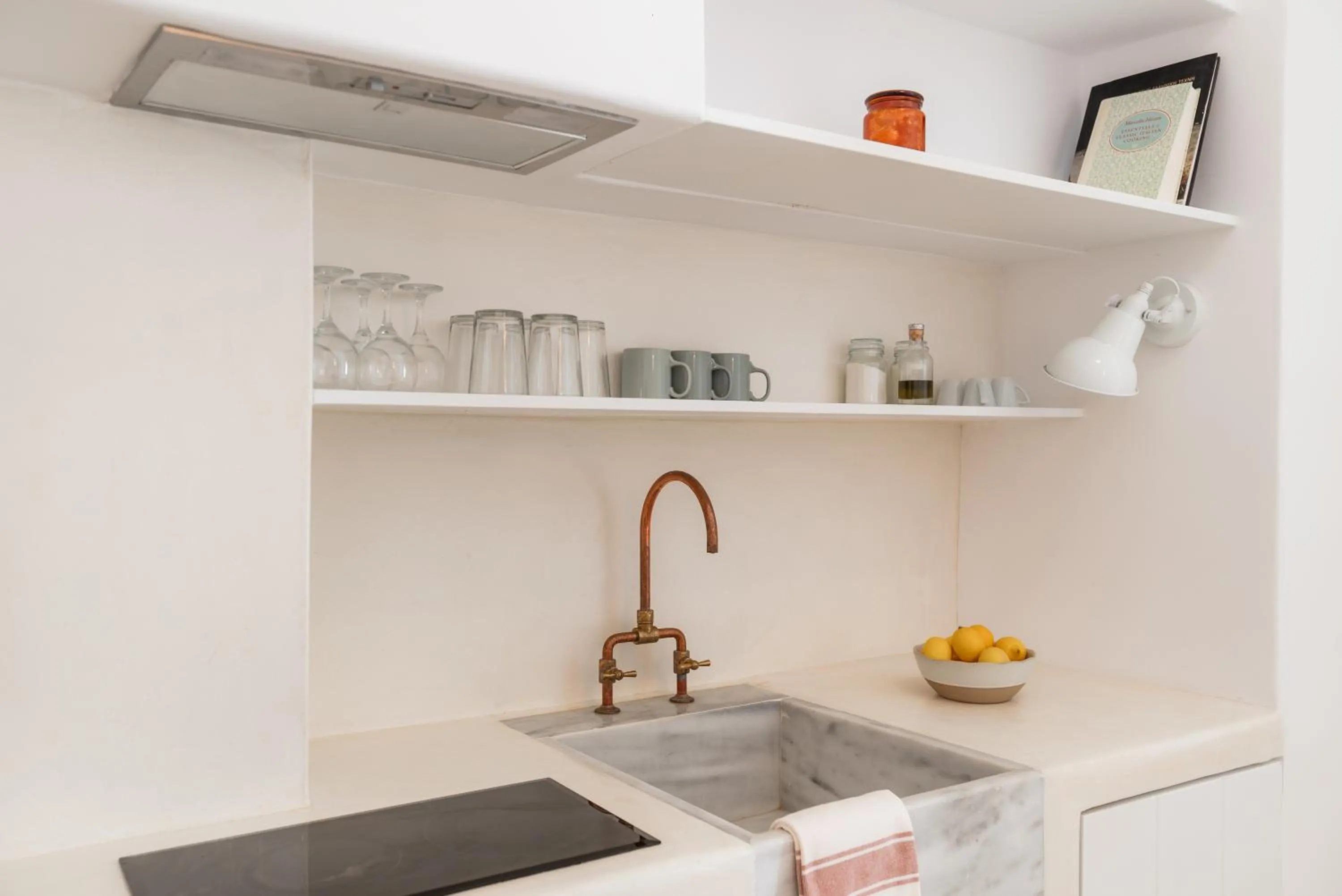 kitchen in aníko suites White Alley