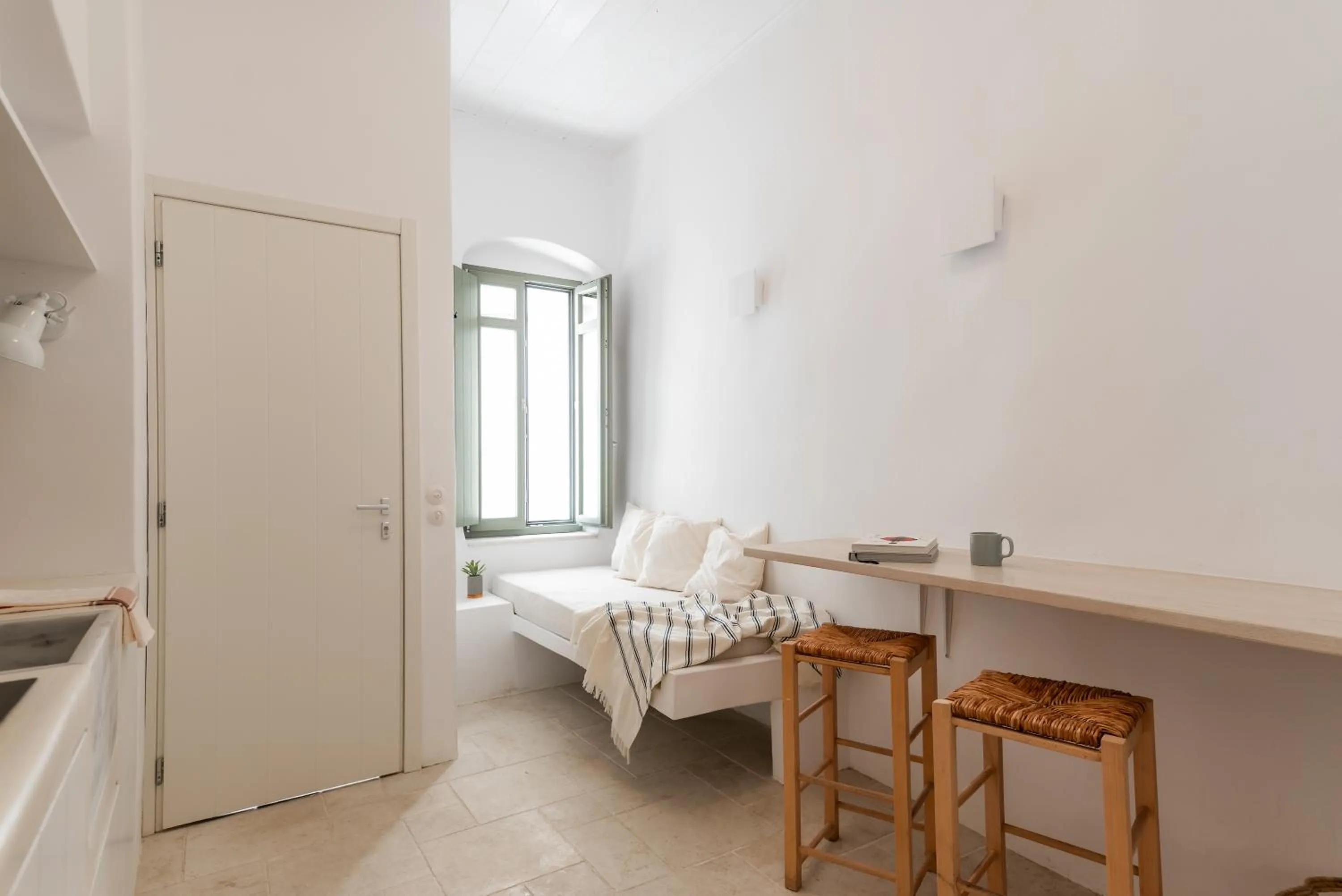 Bed in aníko suites White Alley