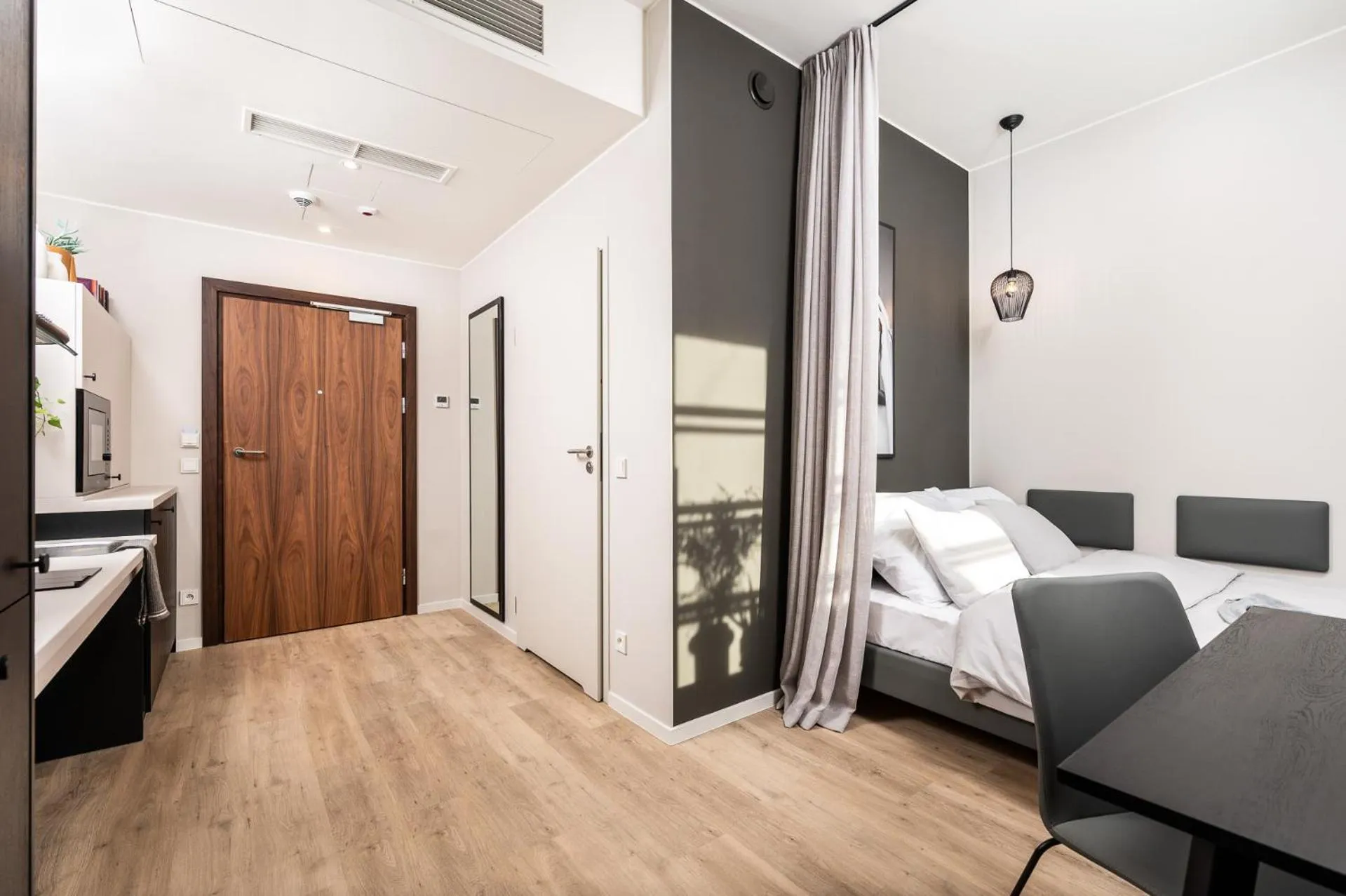 Photo of the whole room in MILESTONE Krakow Center Premium Living by Tribera