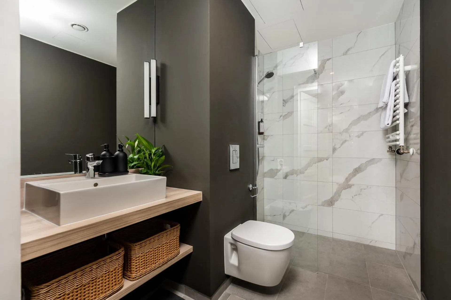 Bathroom in MILESTONE Krakow Center Premium Living by Tribera