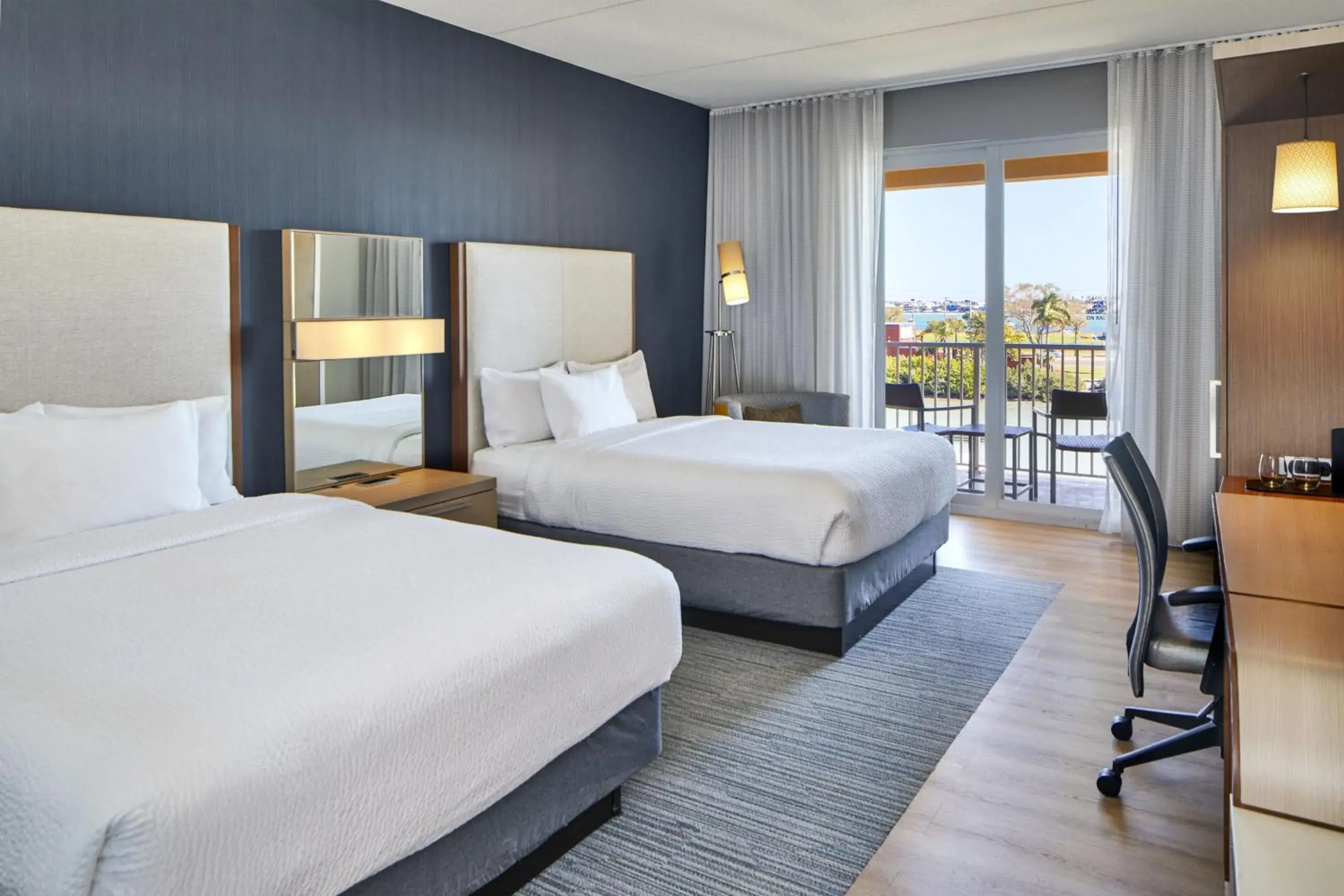 Queen Room with Two Queen Beds, Partial Water View and Balcony in Courtyard by Marriott St. Petersburg Clearwater/Madeira Beach Queen Room with Two Queen Beds, Partial Water View and Balcony in Courtyard by Marriott St. Petersburg Clearwater/Madeira Beach
