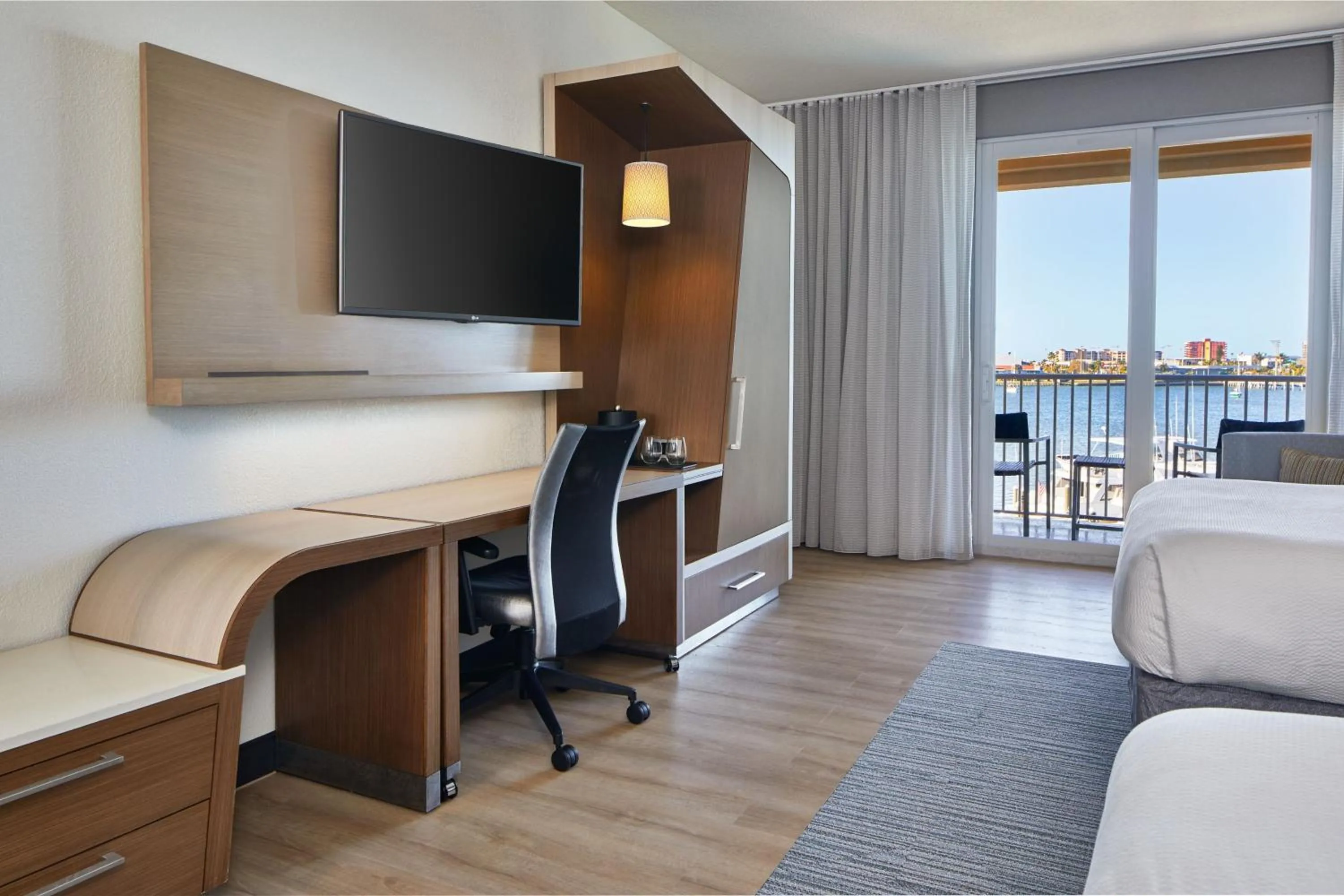 Swimming pool, Bed in Courtyard by Marriott St. Petersburg Clearwater/Madeira Beach