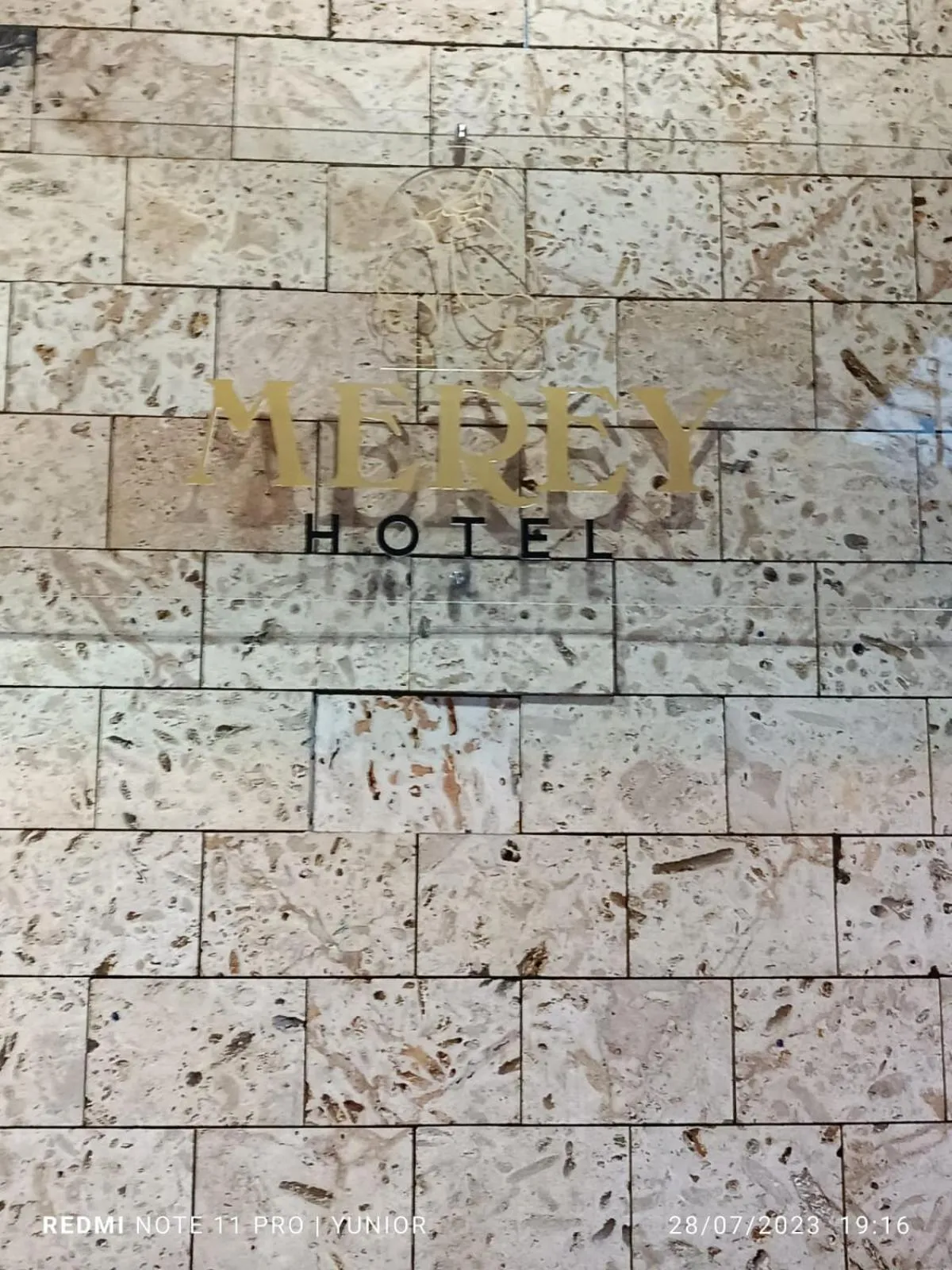 Property logo or sign in Hotel Merey