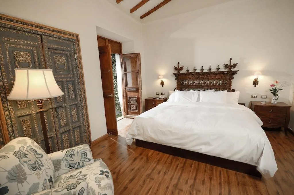 Bed in Palacio Manco Capac by Ananay Hotels