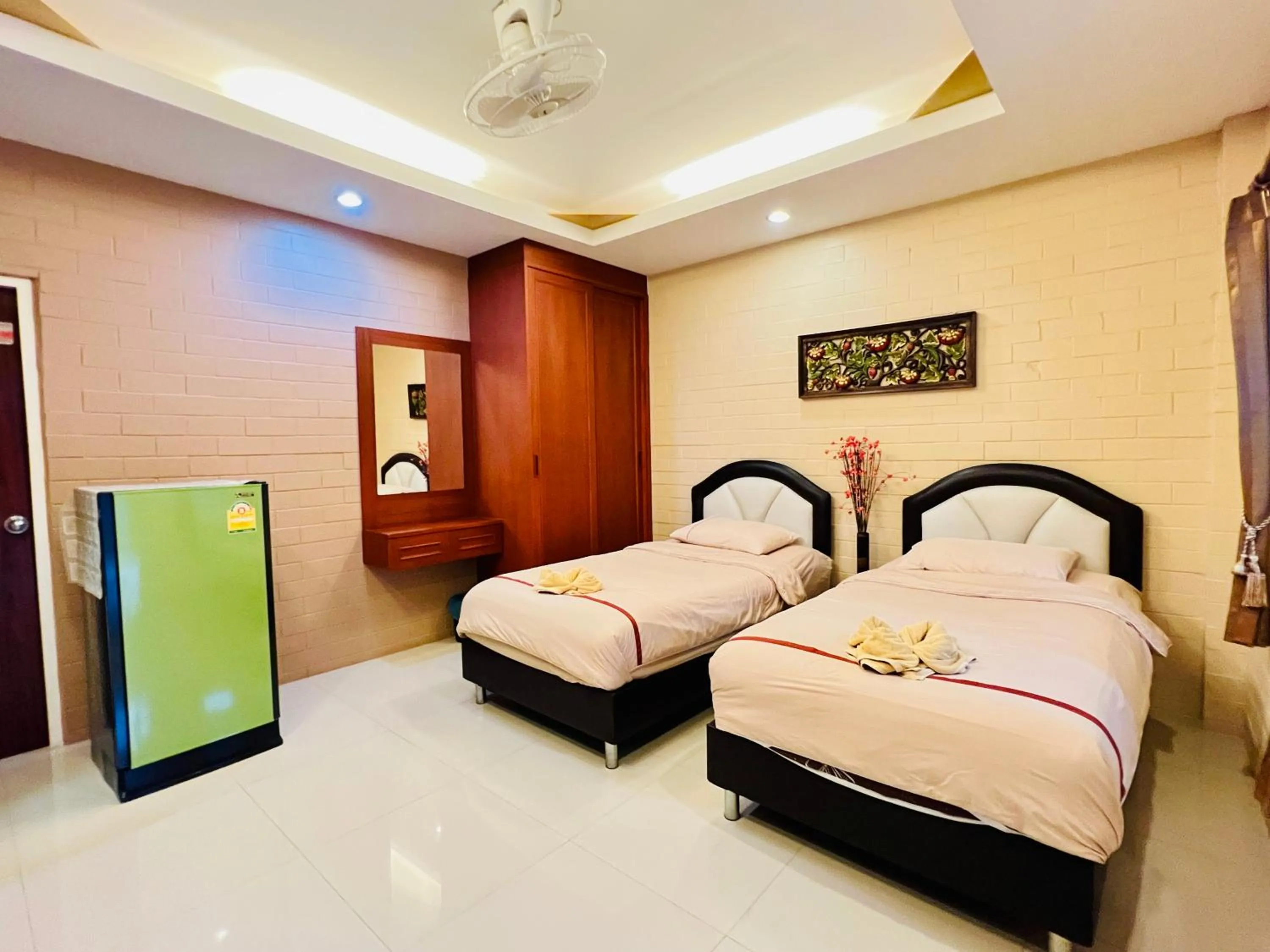 Bed in Benwadee Resort Pattaya