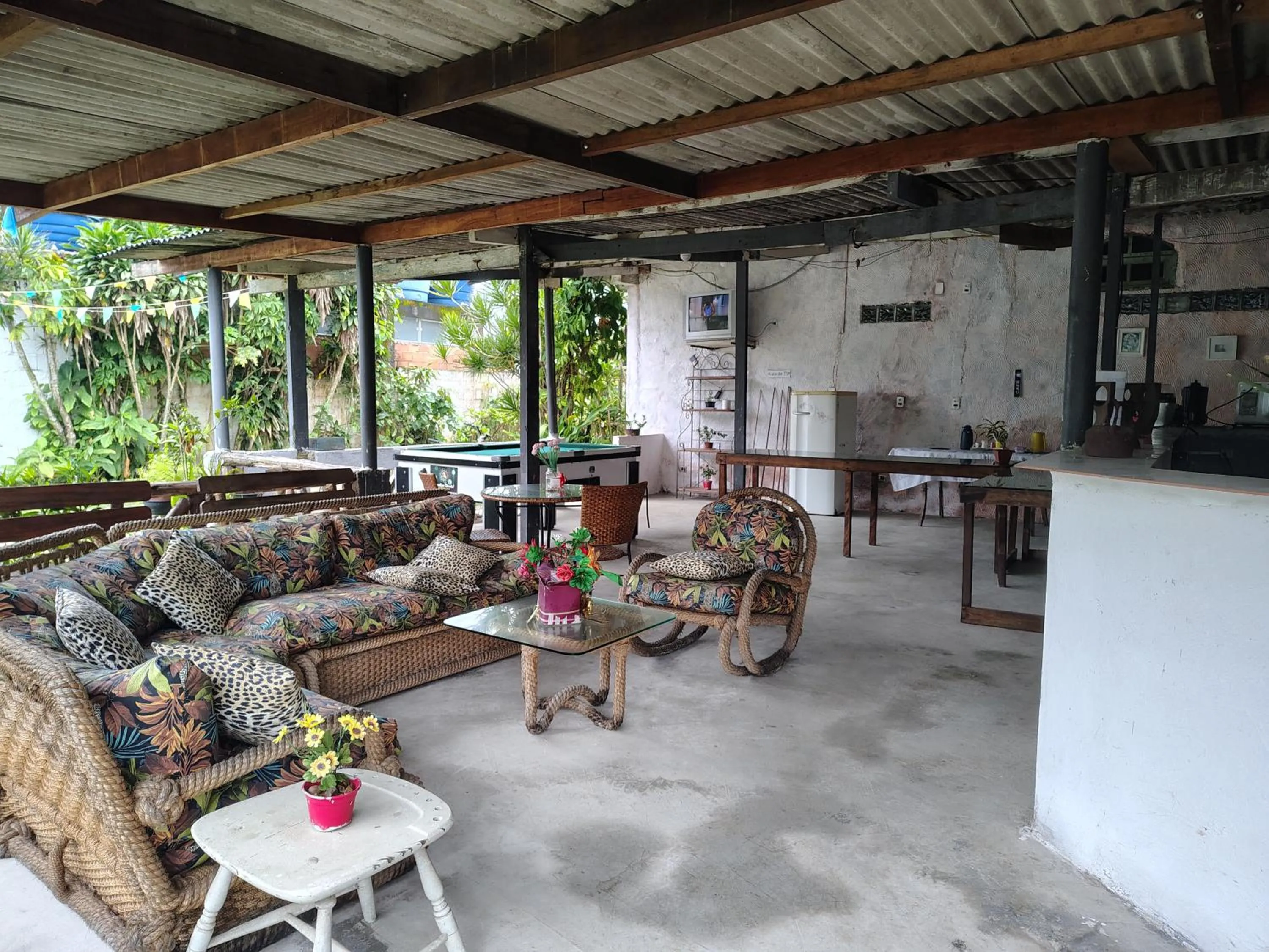 Seating area in Pousada Lambaris Pereque Guarujá
