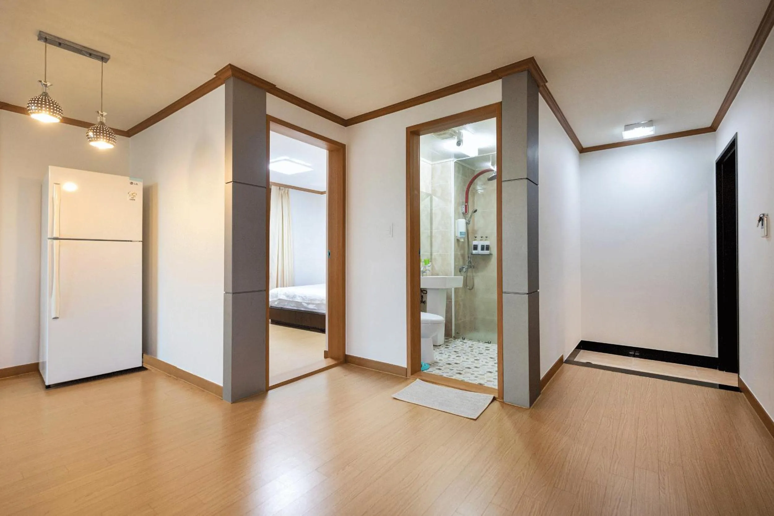 Toilet, Bed in The Bay Jeju Resort