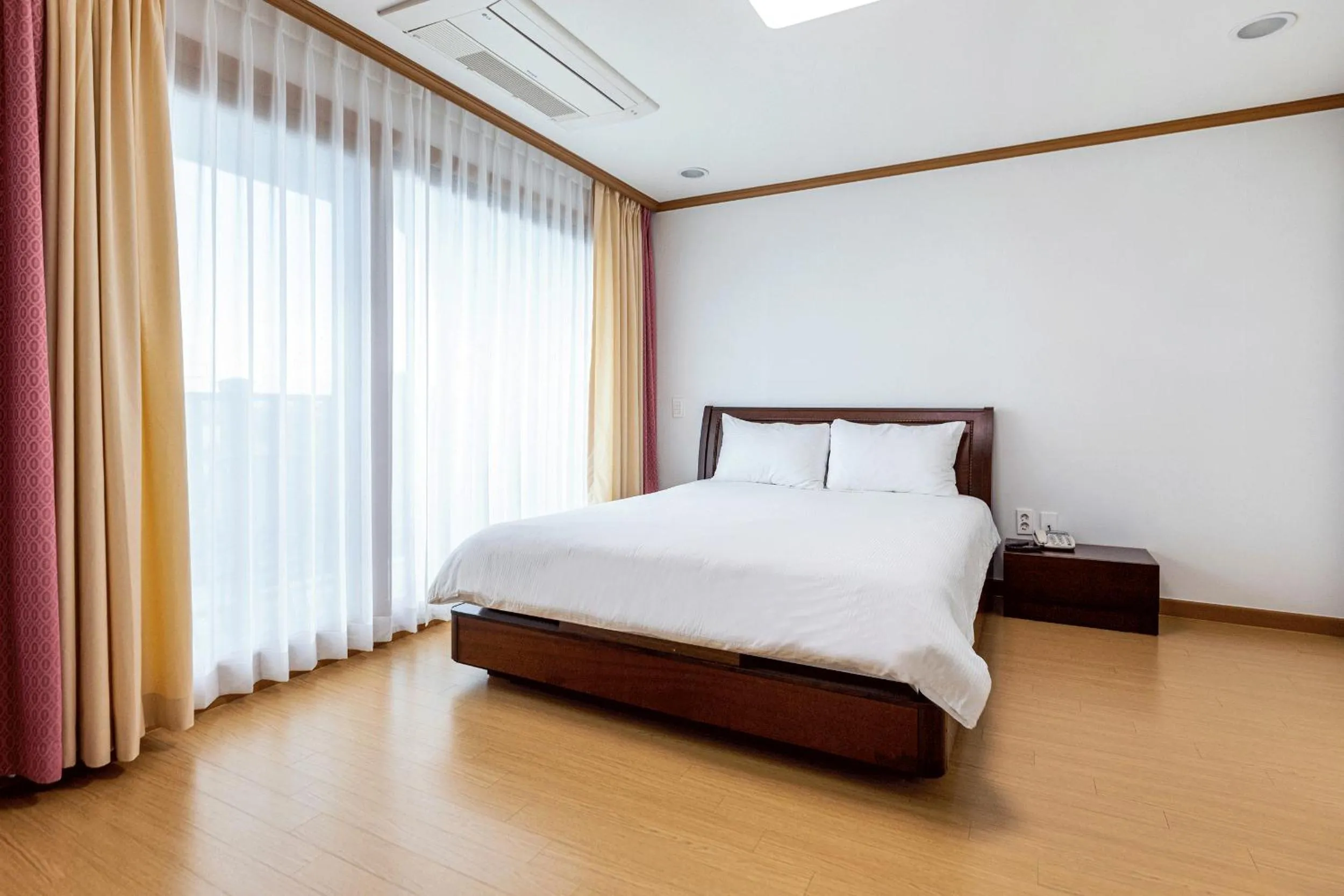 Photo of the whole room, Bed in The Bay Jeju Resort