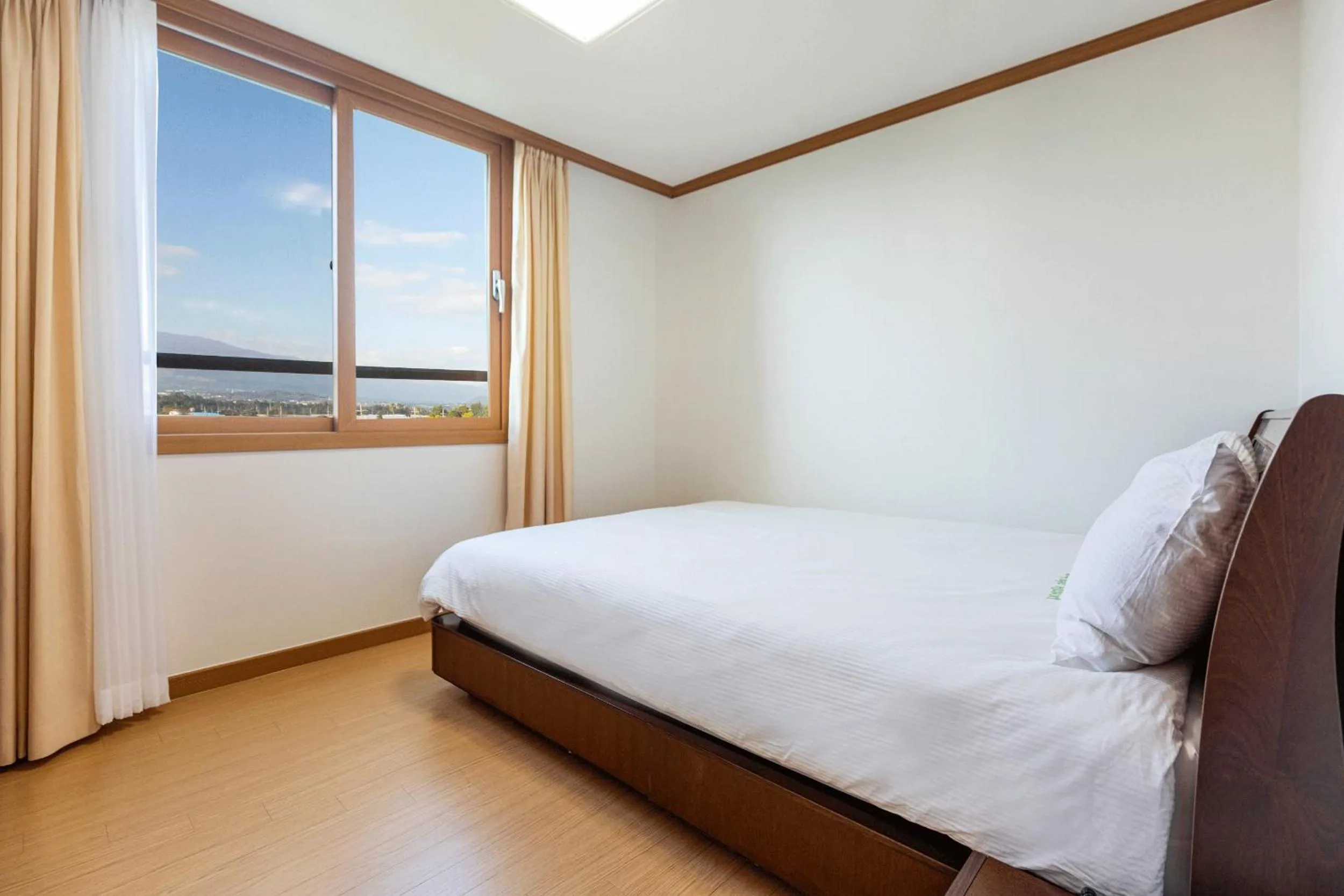 Bed in The Bay Jeju Resort