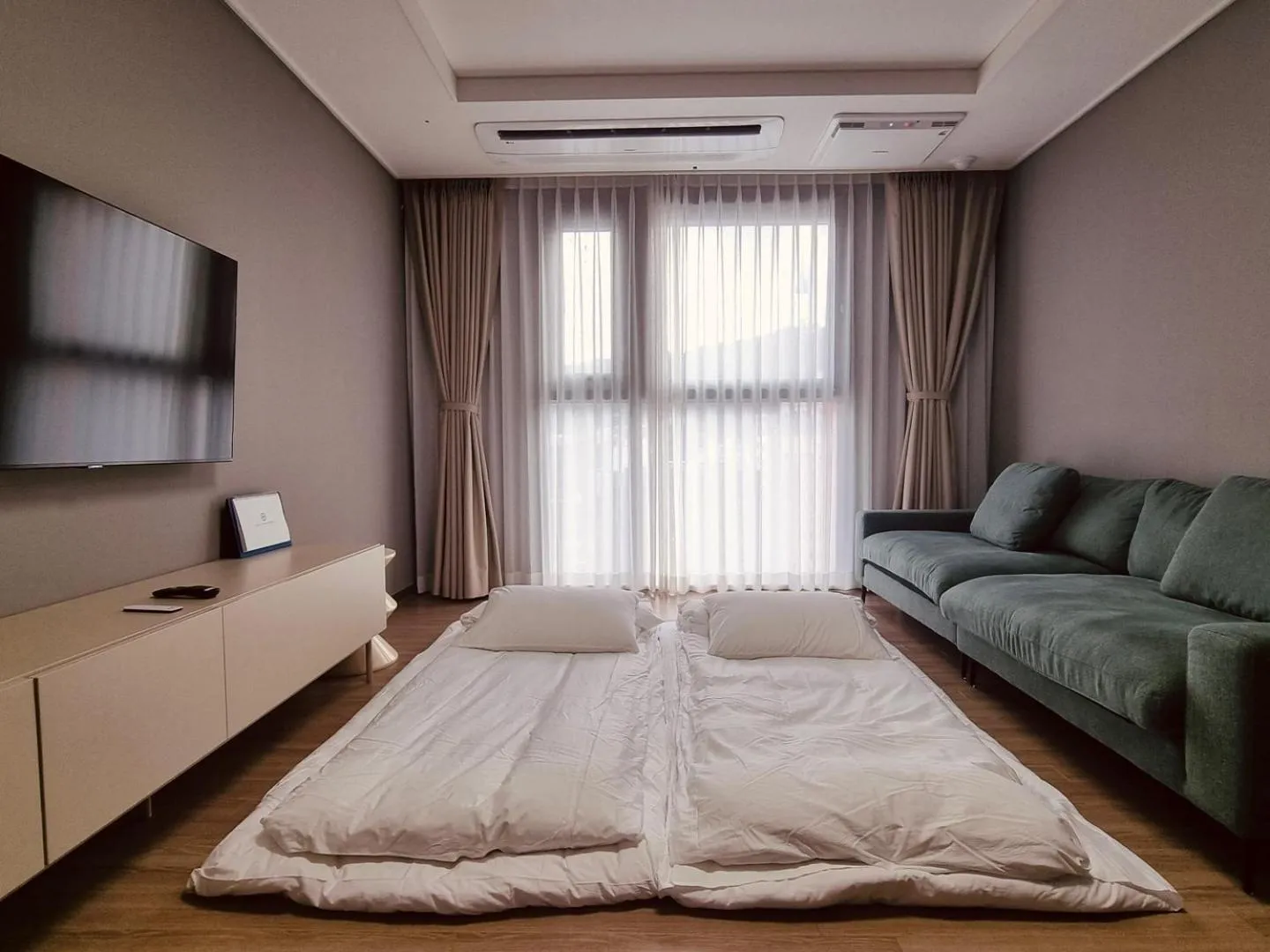 Living room, Bed in Sollago Myeongdong Hotel & Residence