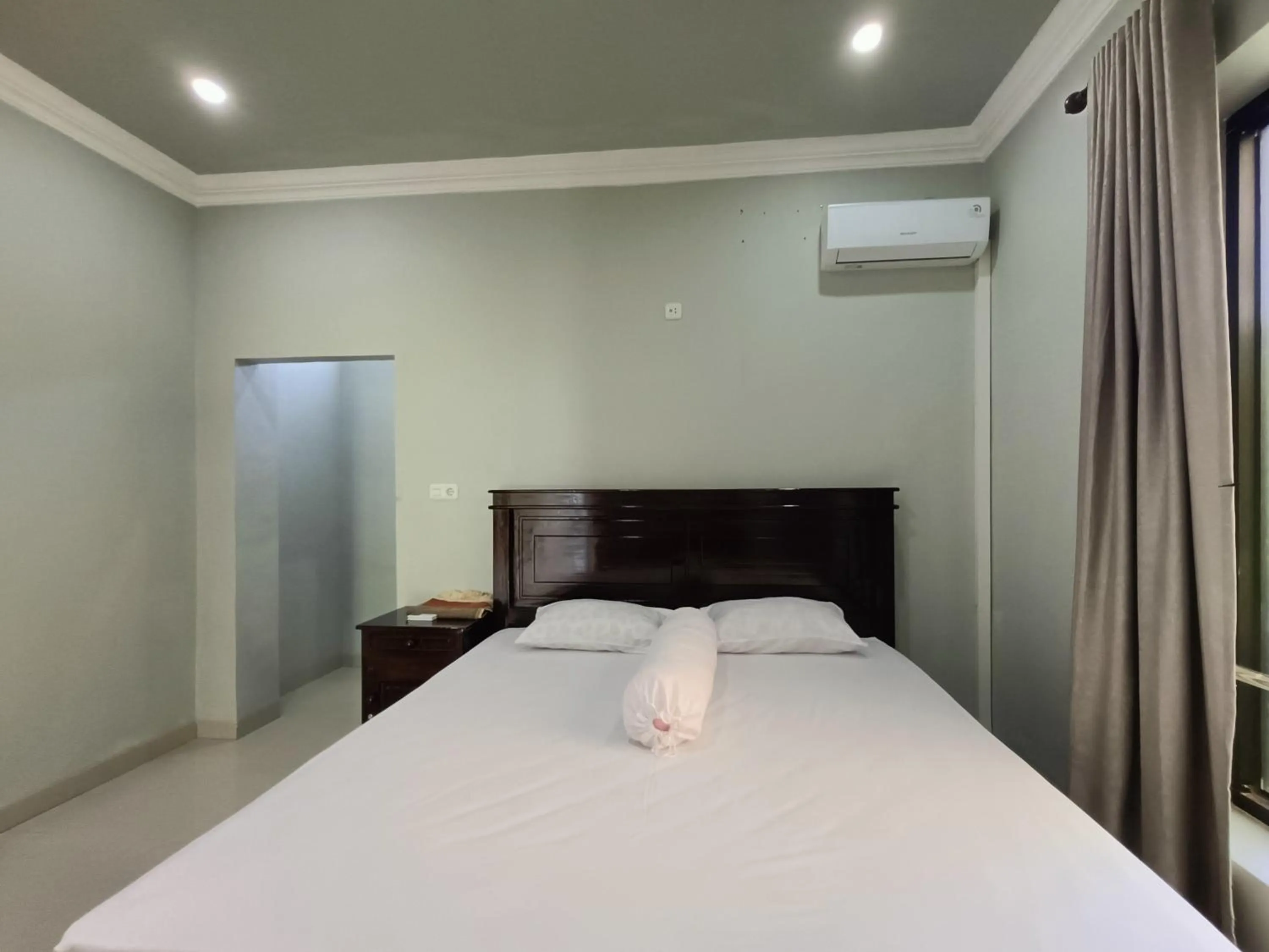 Bed in RedDoorz @ Green Homestay Syariah Baubau